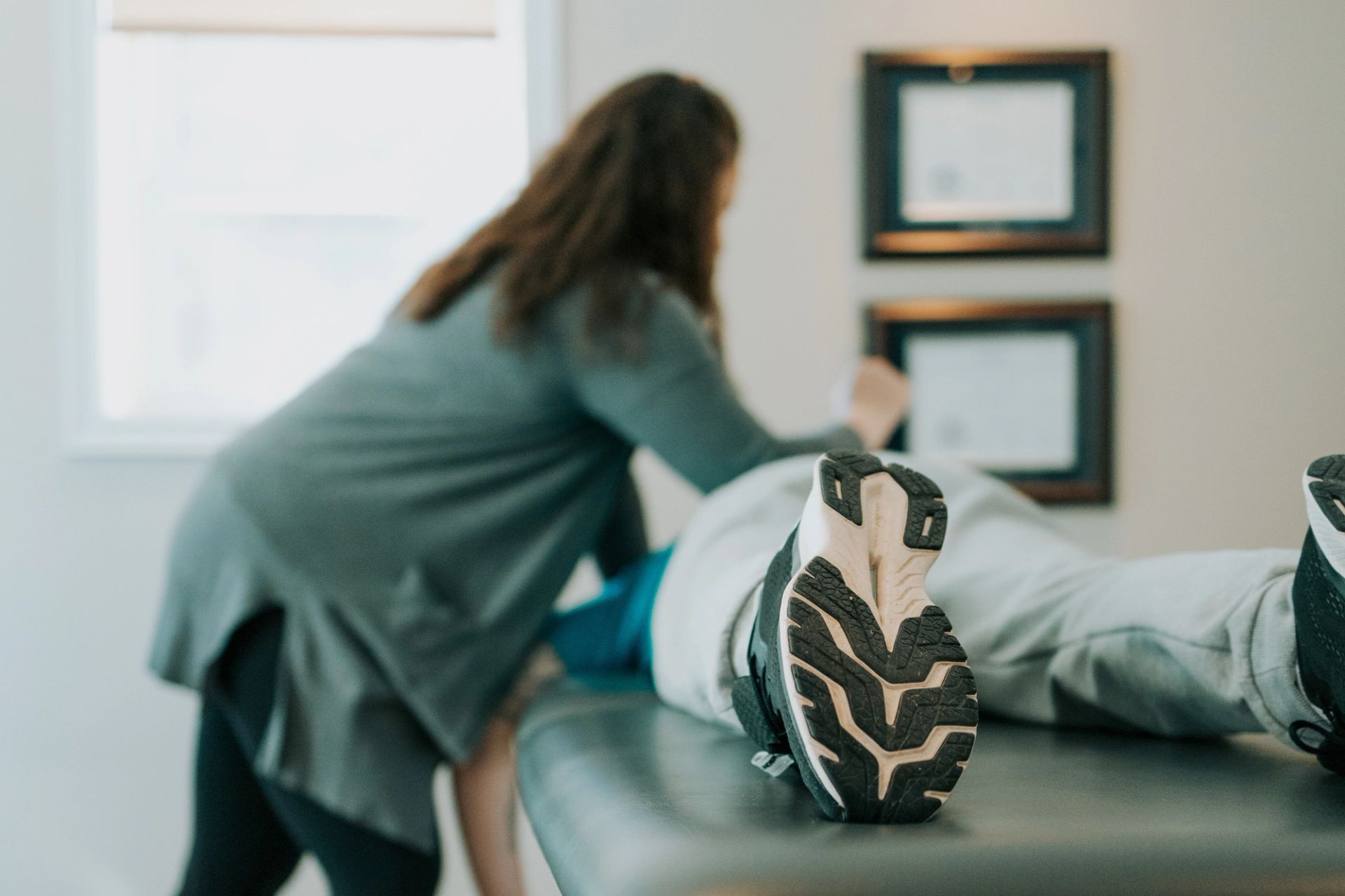 Ashley giving a client a sports massage