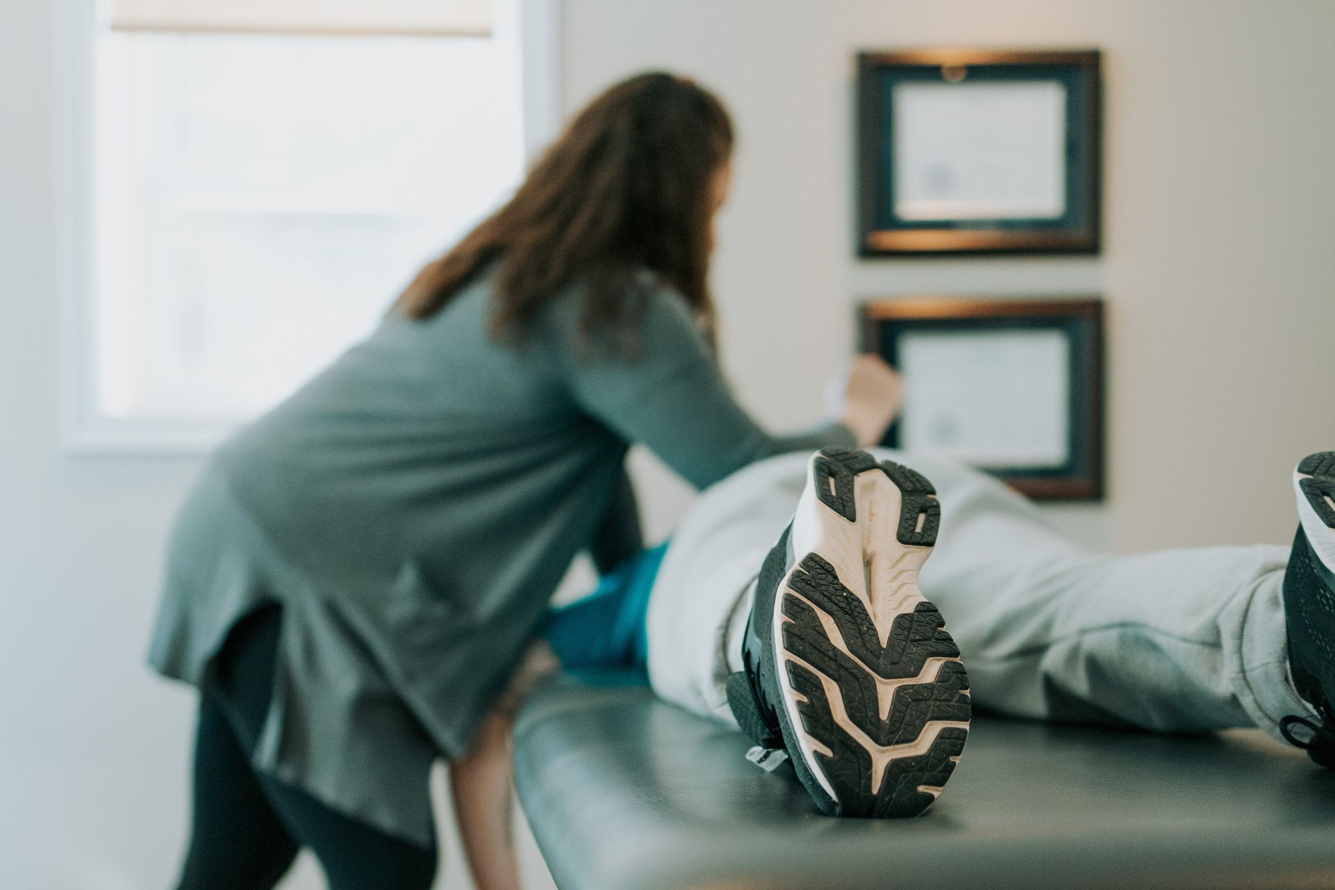 Ashley giving a client a sports massage