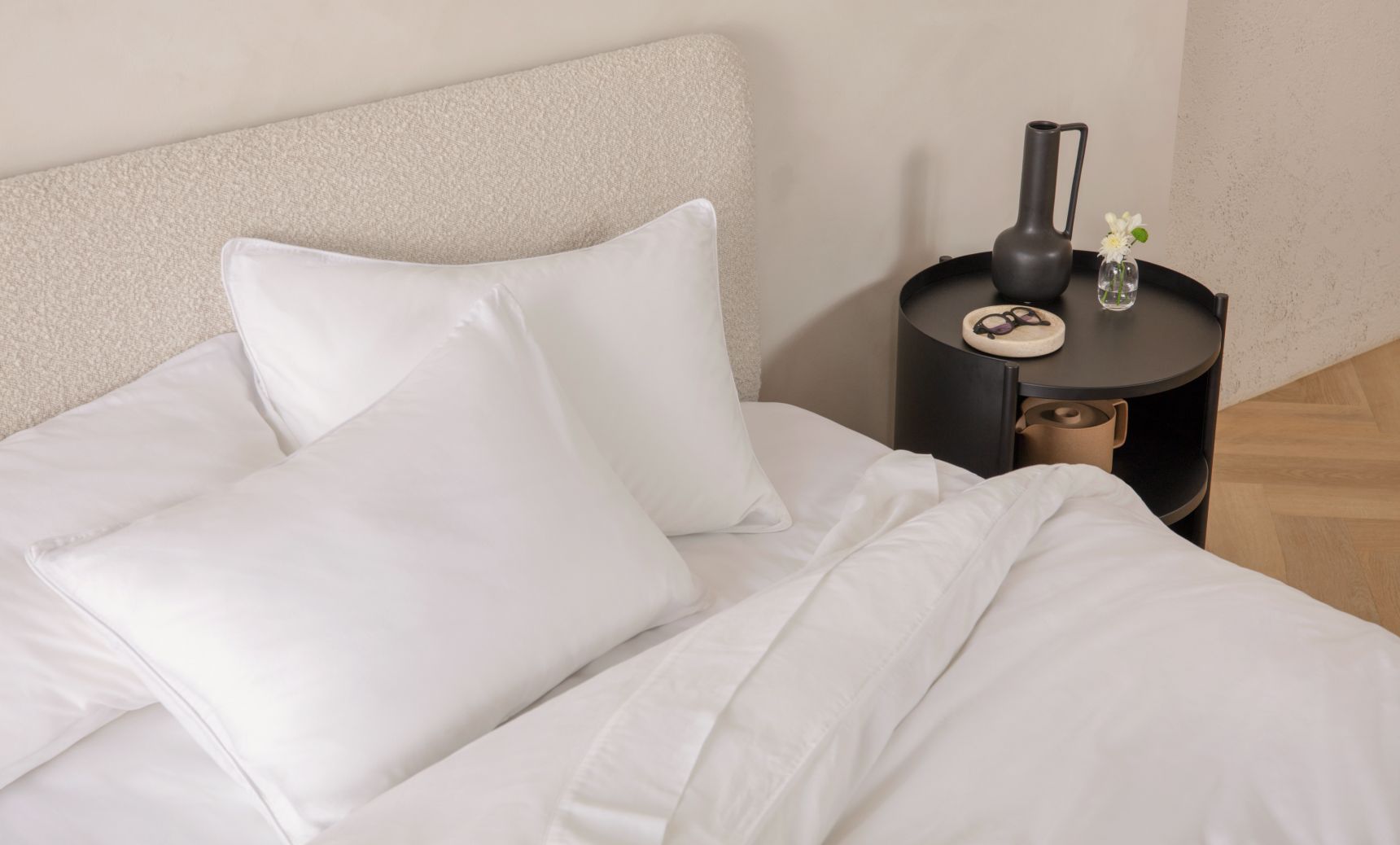 Upholstered Platform Bed in cream colour with natural colour legs