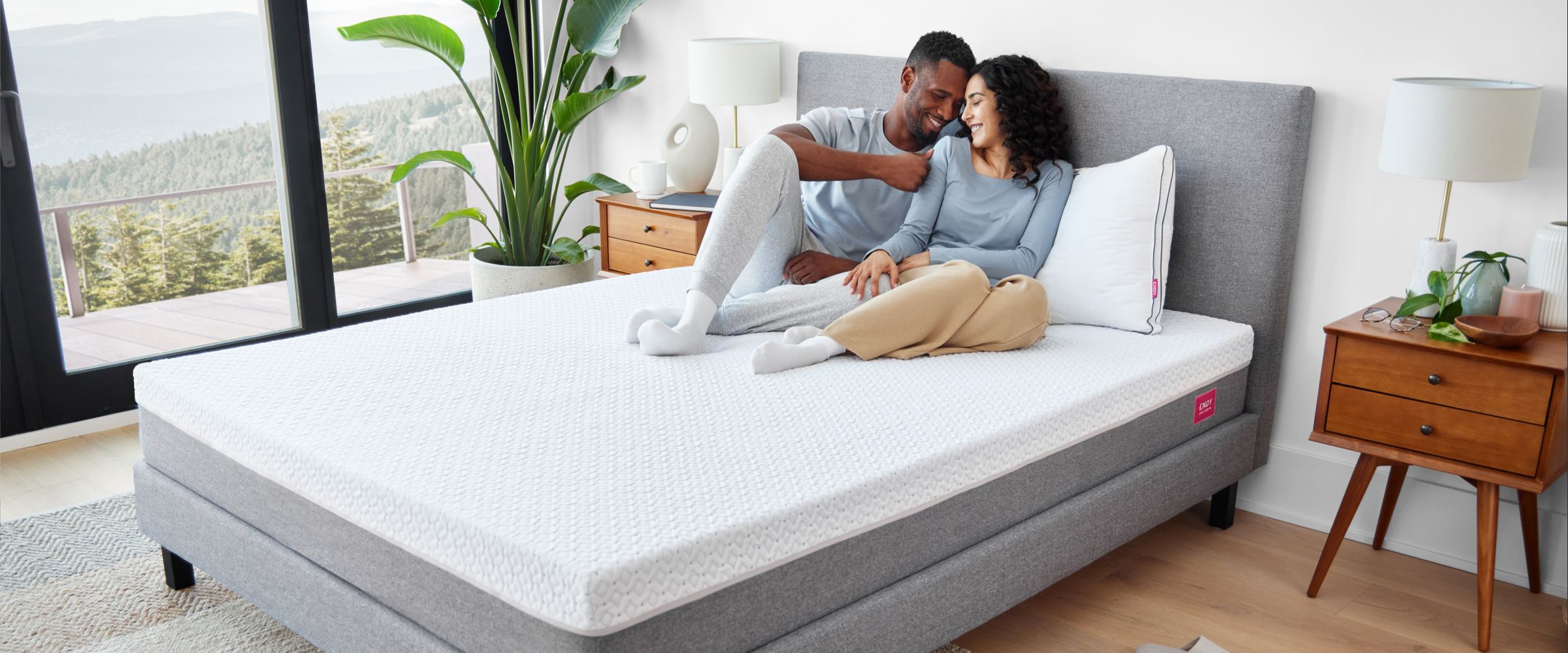 Two people relaxing on an Endy Mattress.
