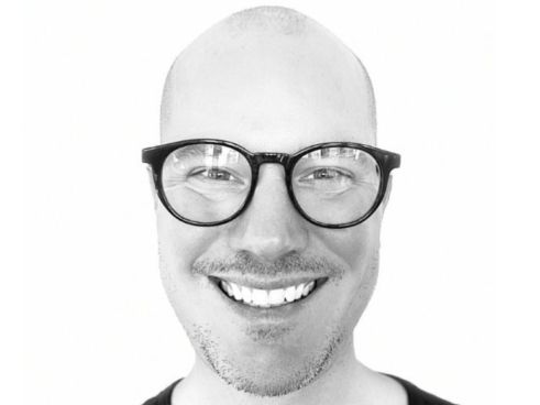 A headshot of Andrew Reeves, Head of Strategy at The Royals.