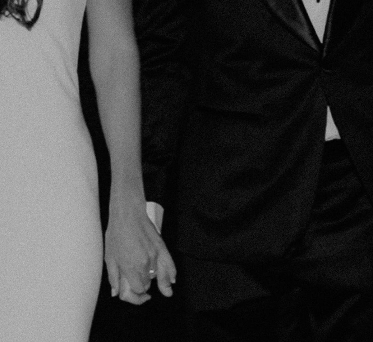 Close-up of a couple holding hands