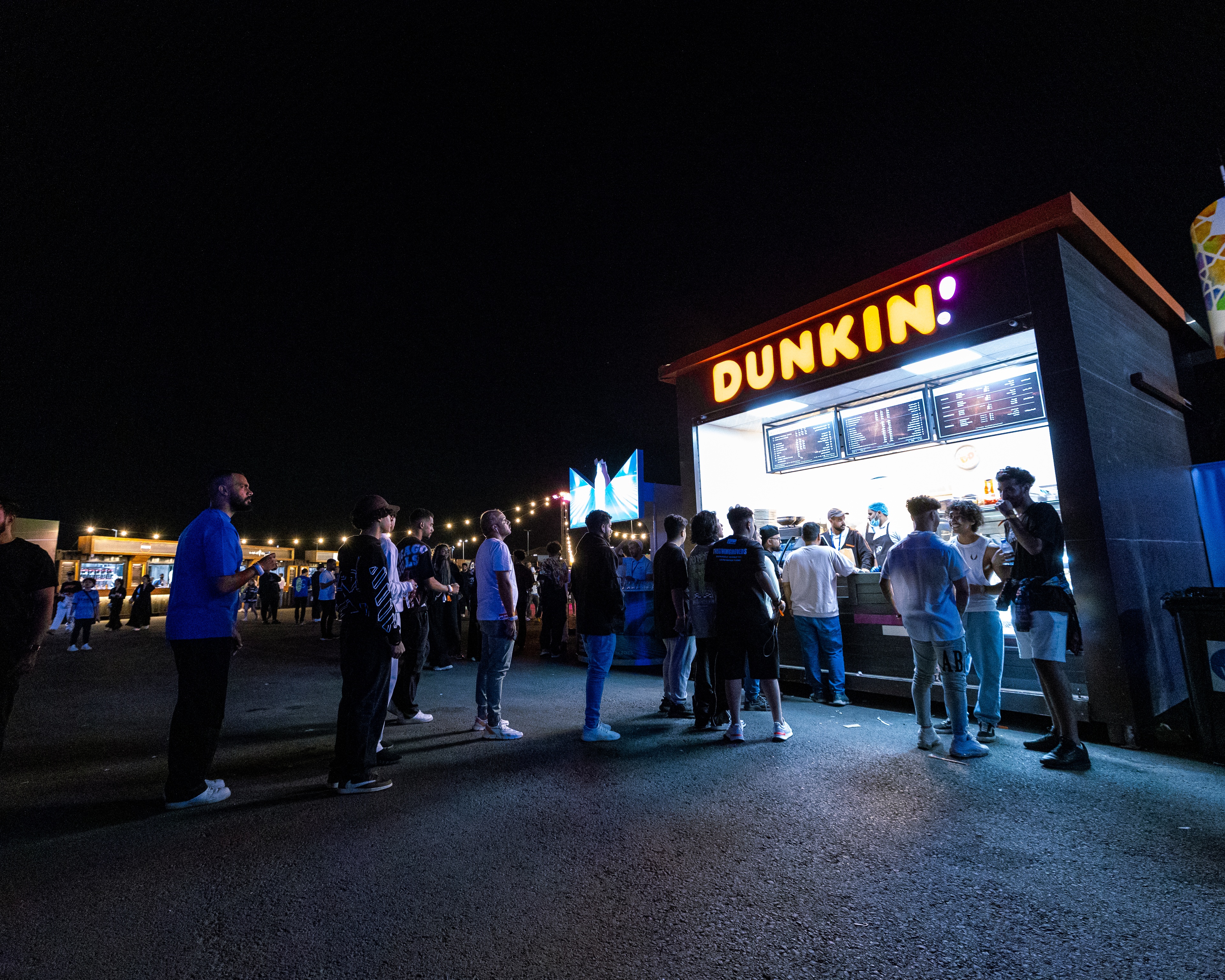 Formula 1 Saudi Arabian Grand Prix Concert people in line at dunkin