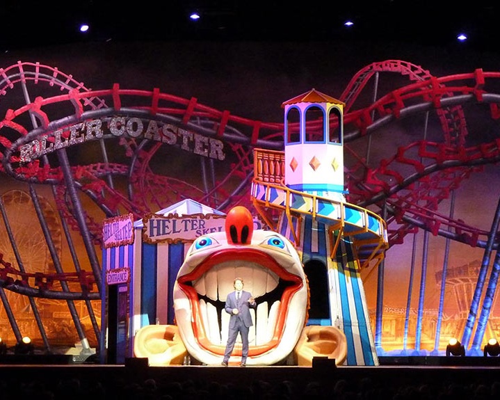 Stage with roller coaster and clown