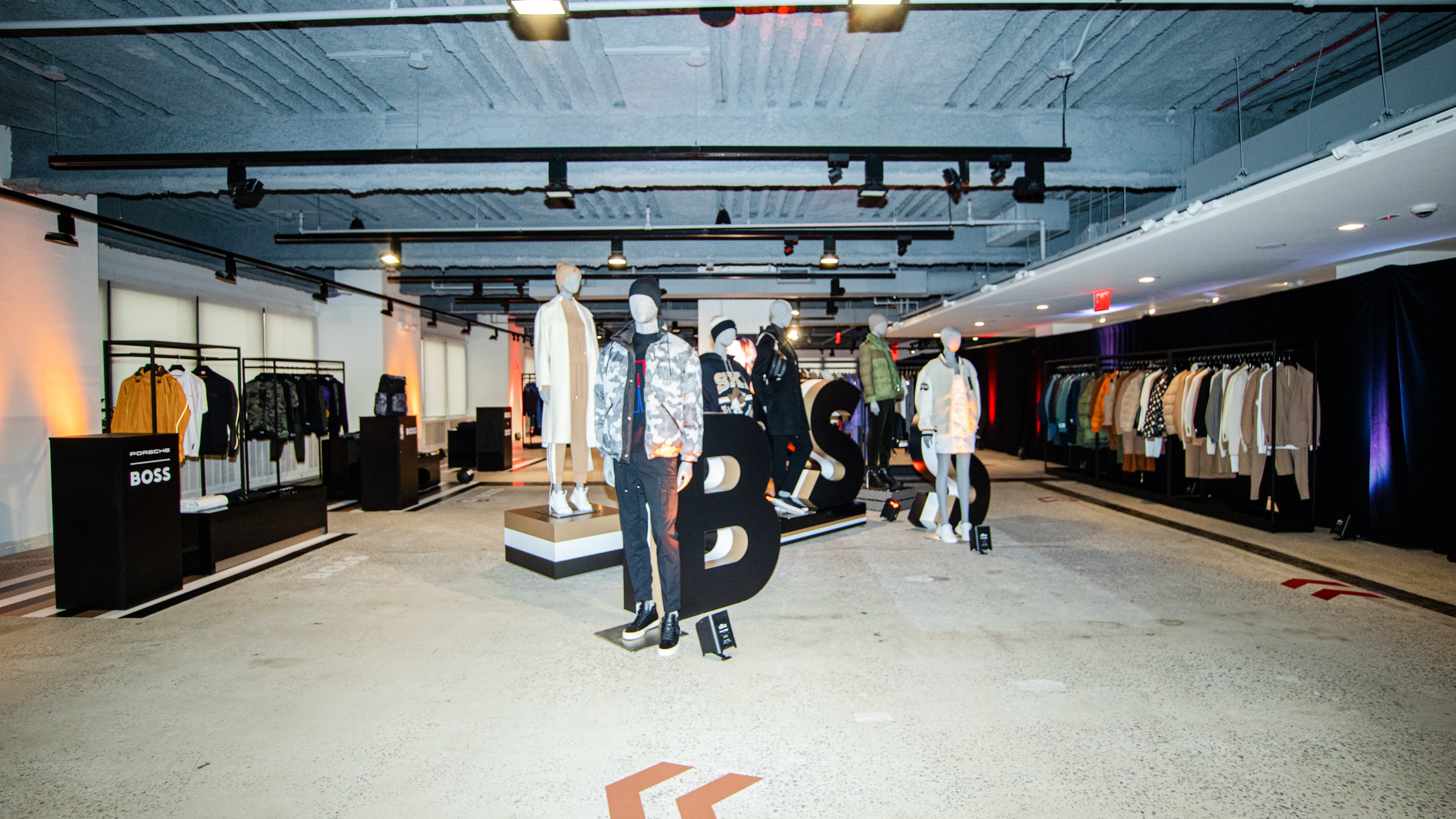 Store with merchandise and BOSS in big black letters