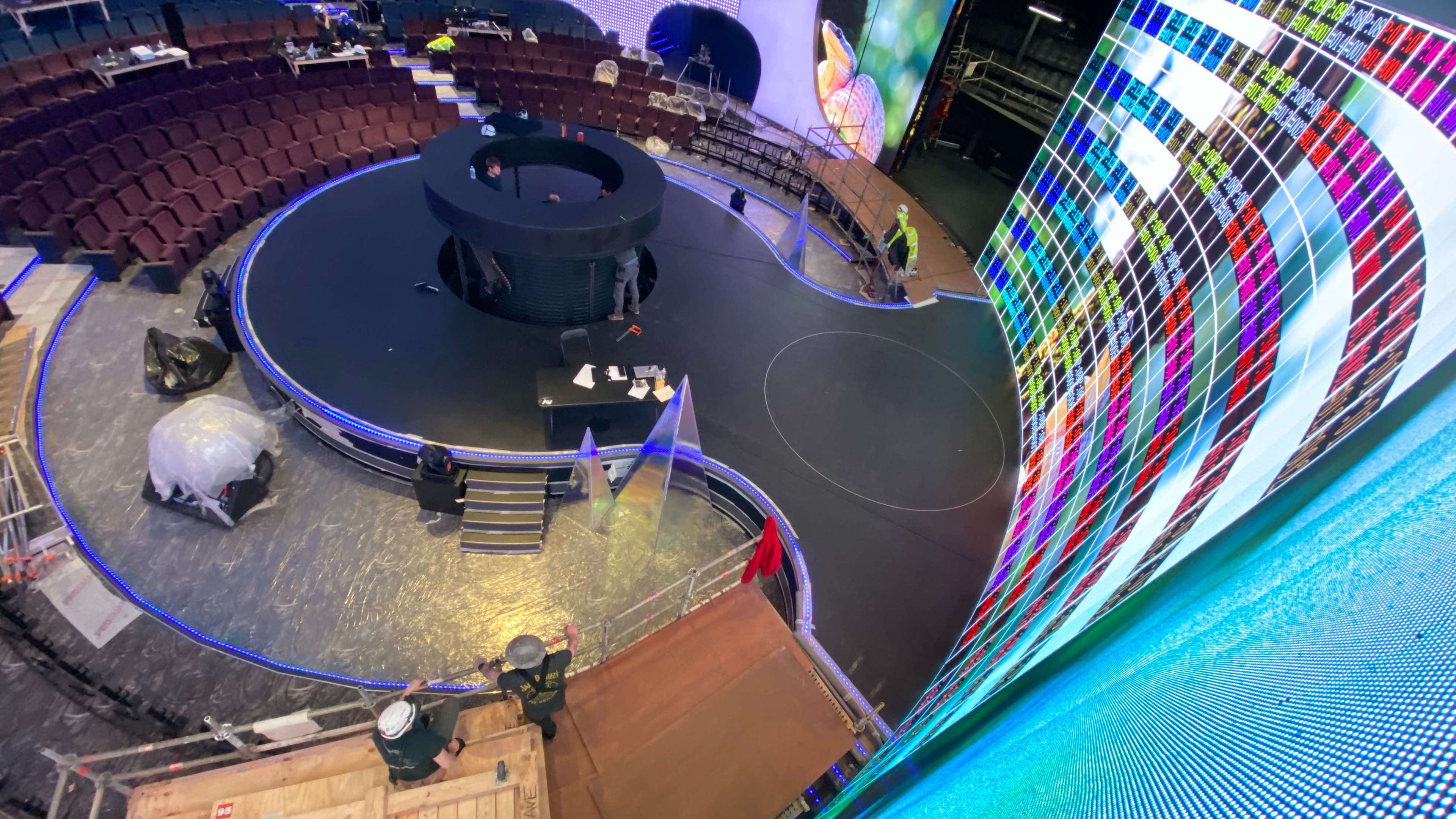 Huge LED screen testing on cruise ship with round stage and seating