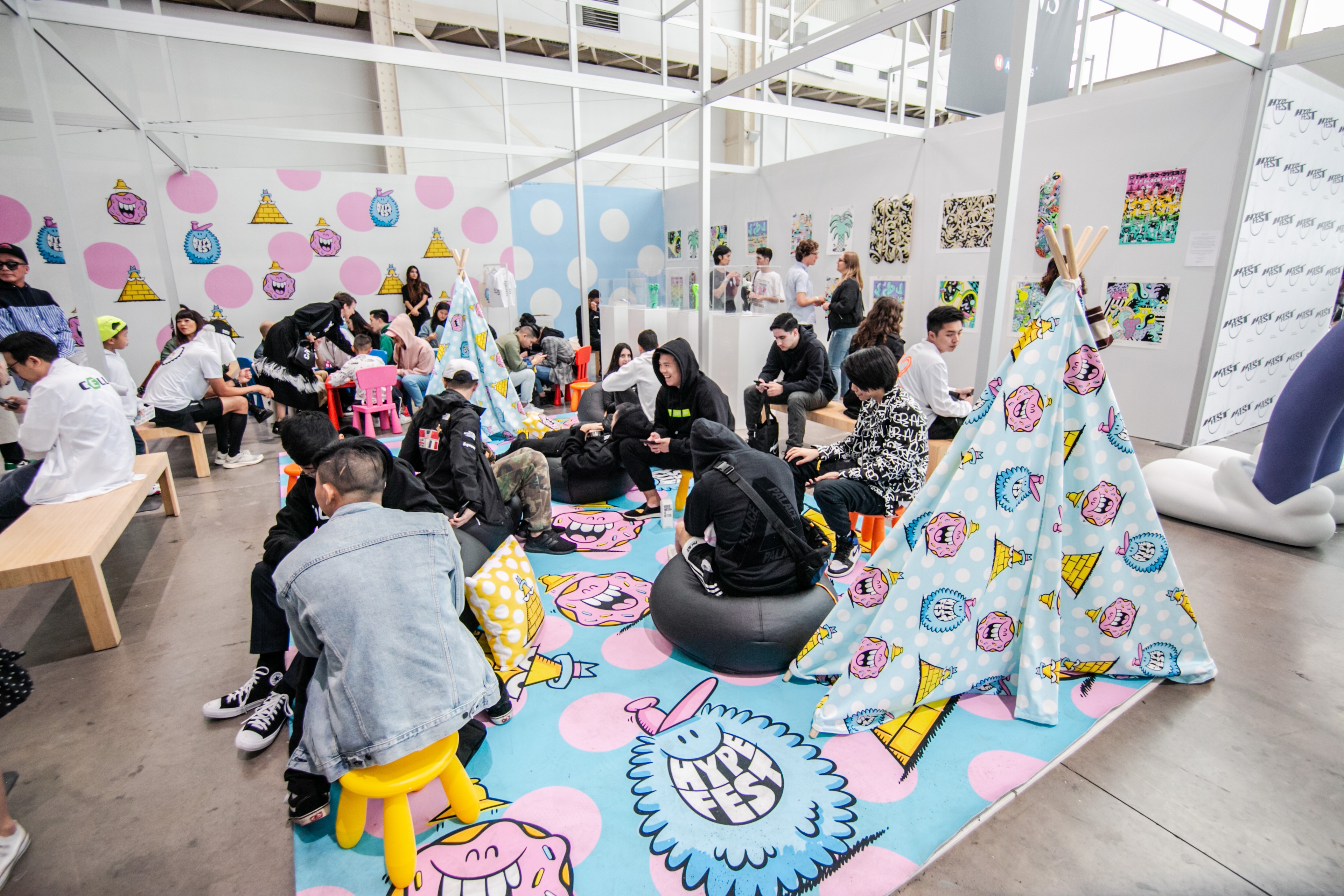 HYPEFEST attendees sitting in pop up booth