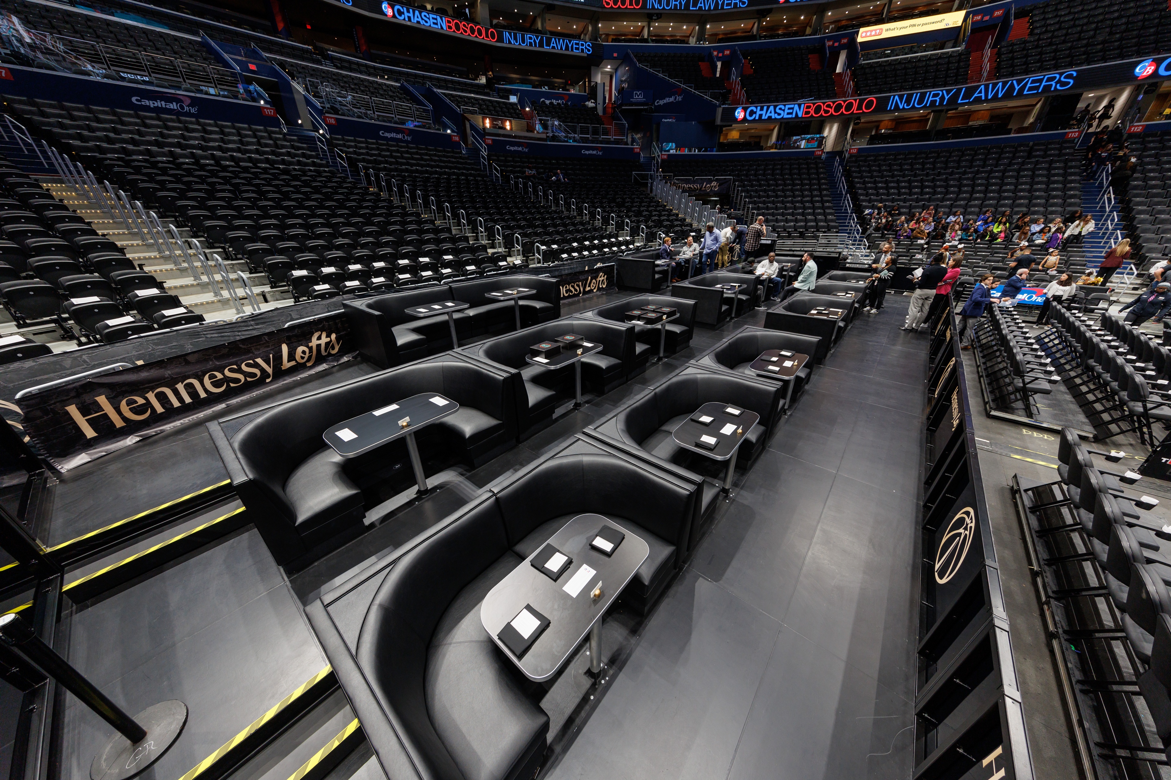 detailed shot featuring the Courtside Hennessy Lofts: custom banquette seating with tables