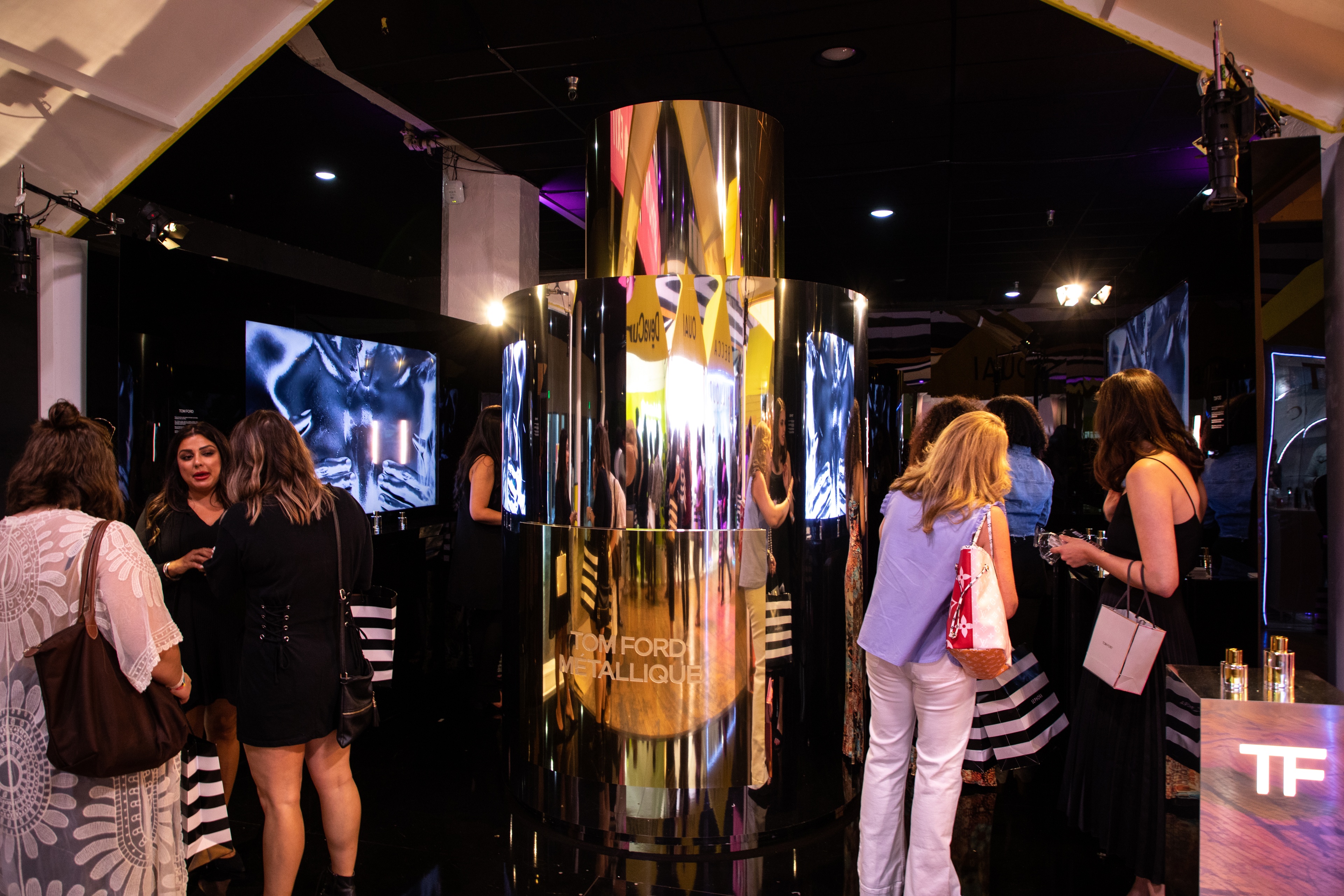 10 ft gold metallic replica of Tom Ford product