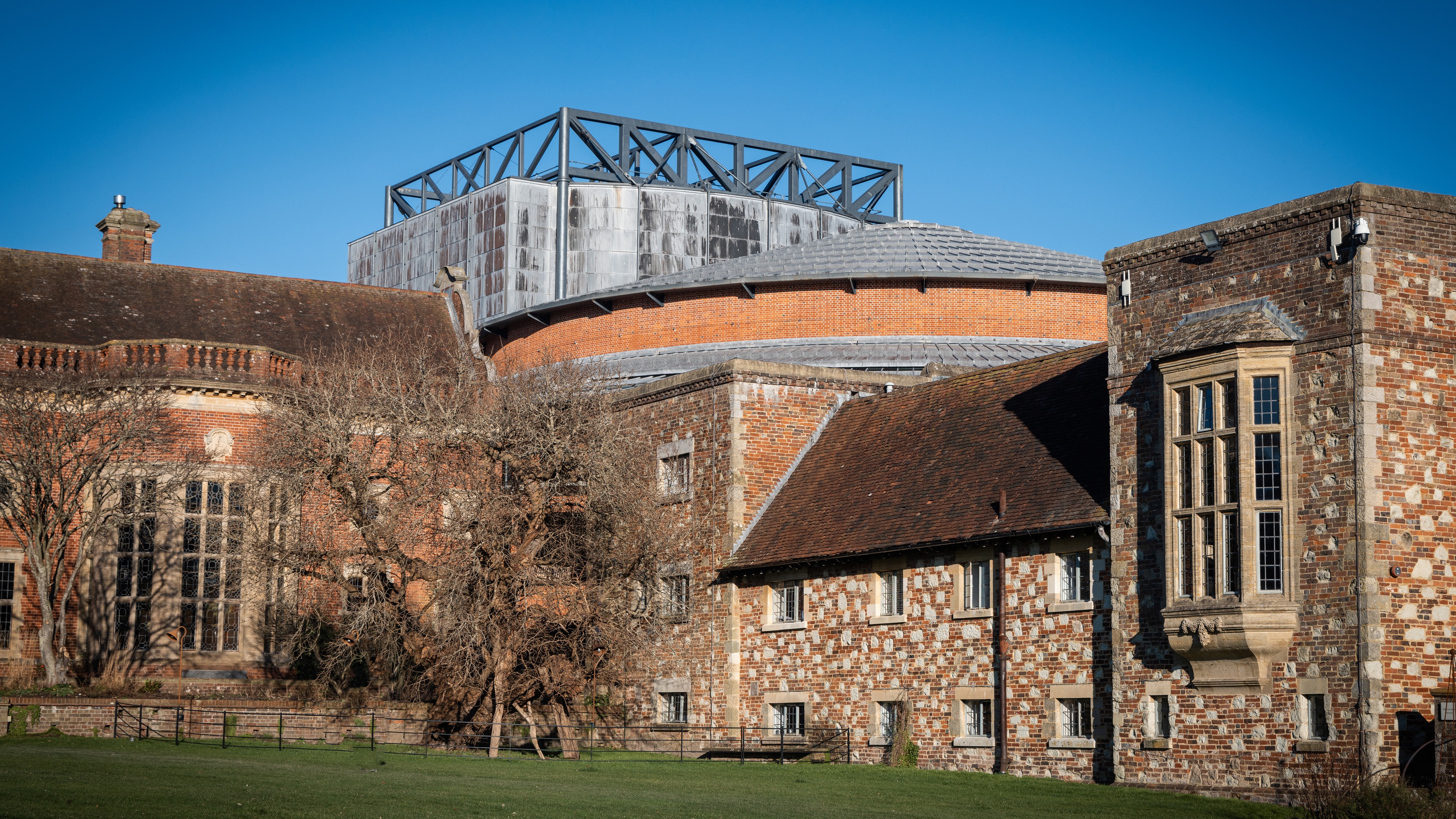 Glyndebourne Opera House exterior blue sky
