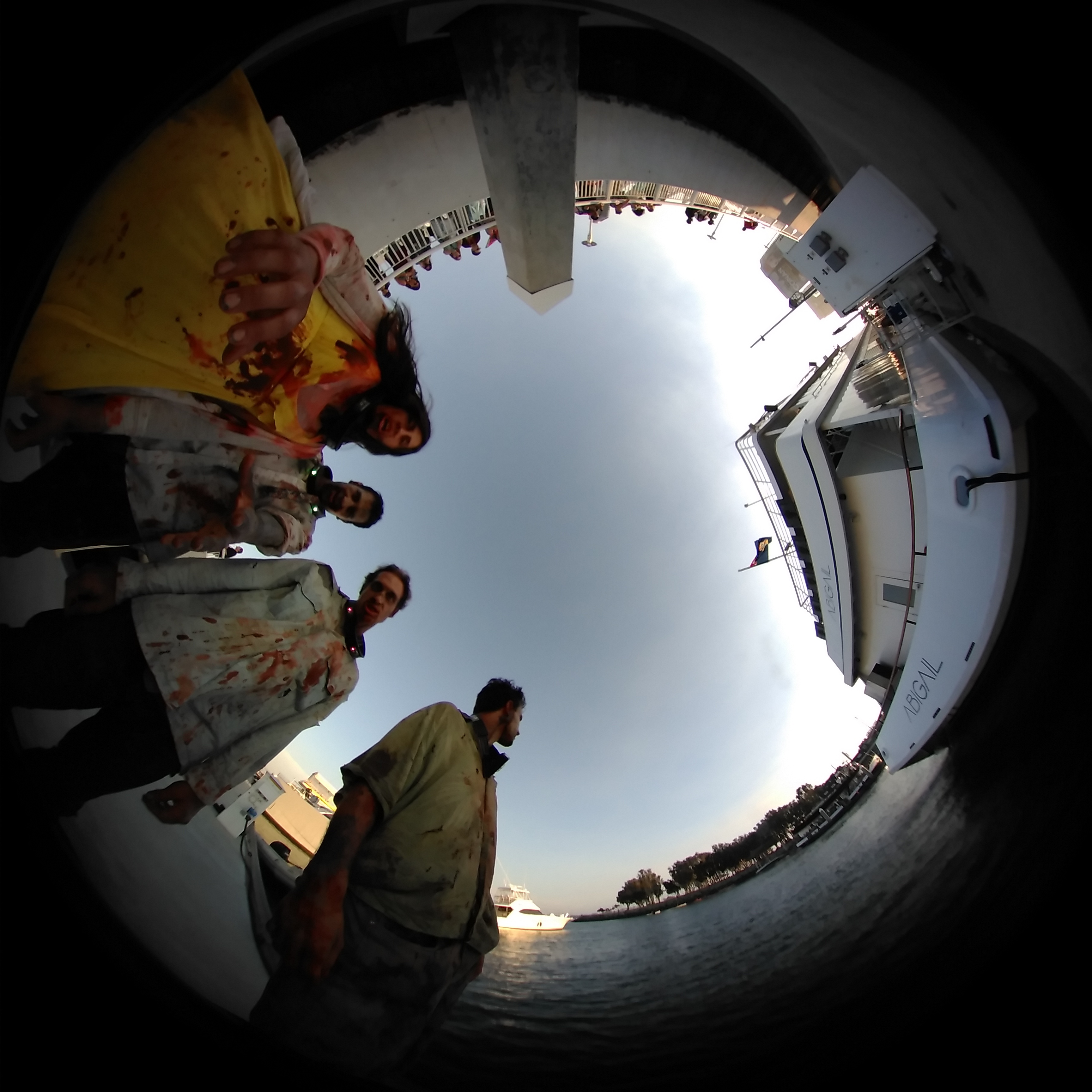 Zombies posed in front of fisheye lens