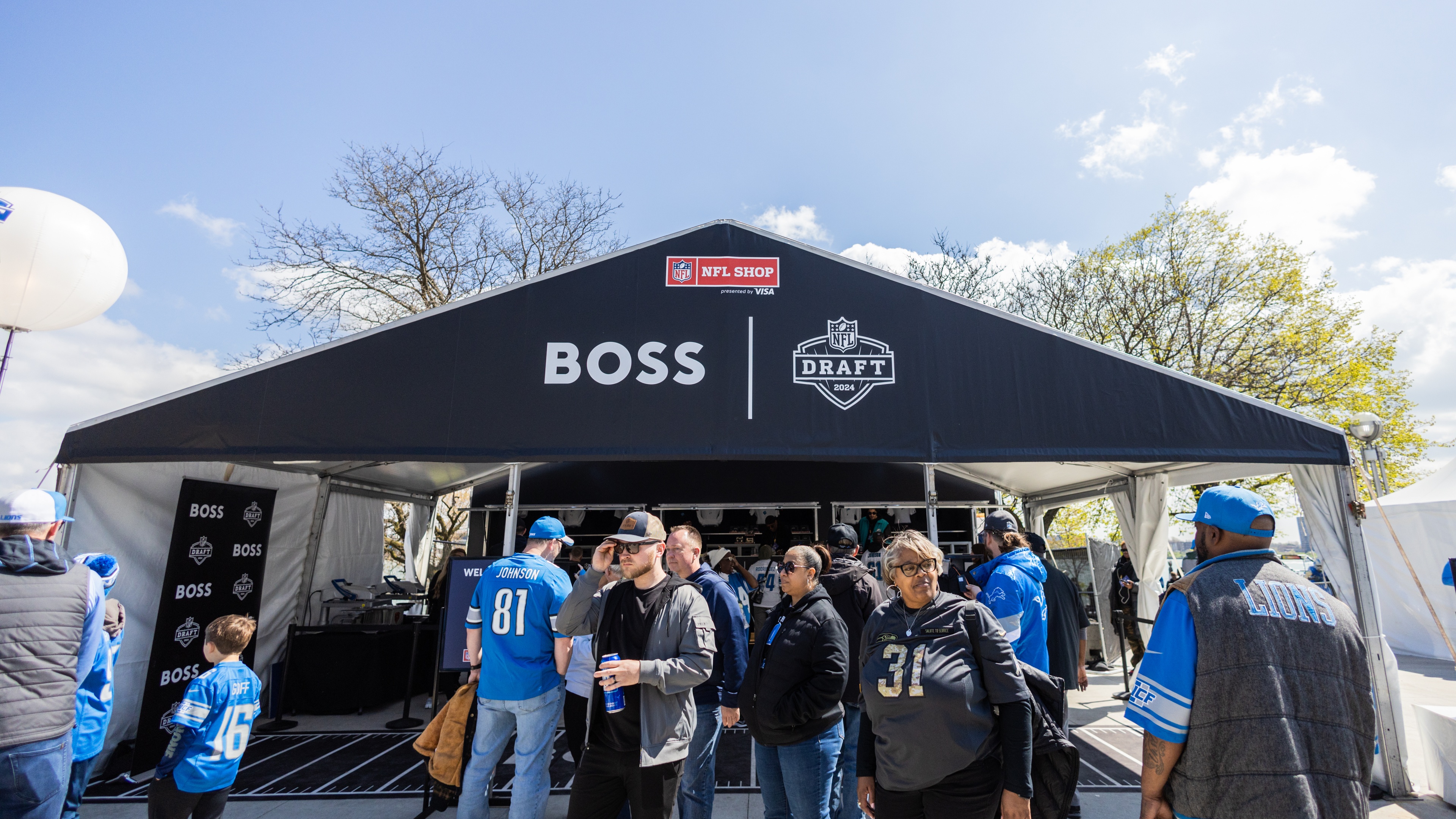 Black tent with BOSS and NFL Draft on front