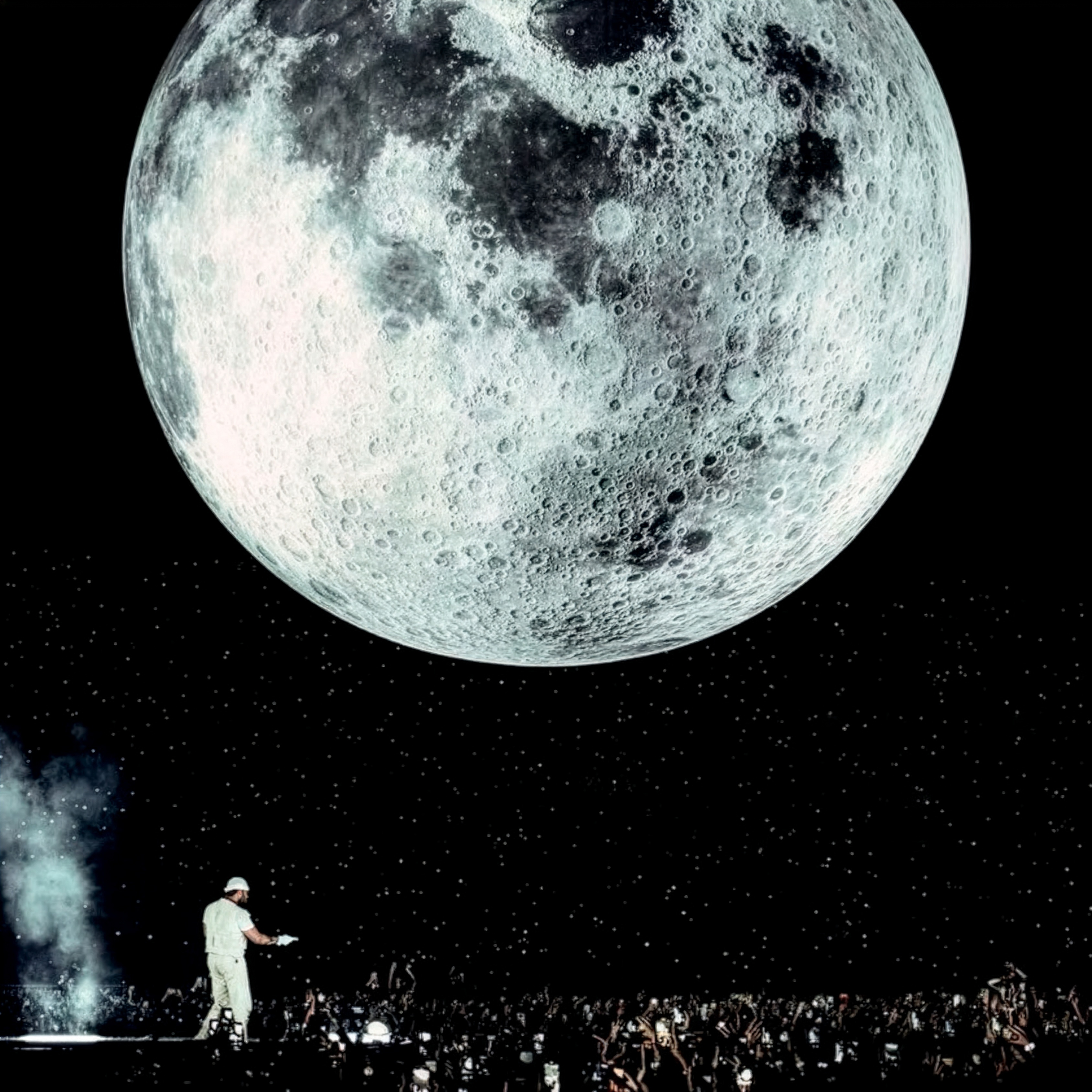 The Weeknd performing on stage above is a large inflatable moon