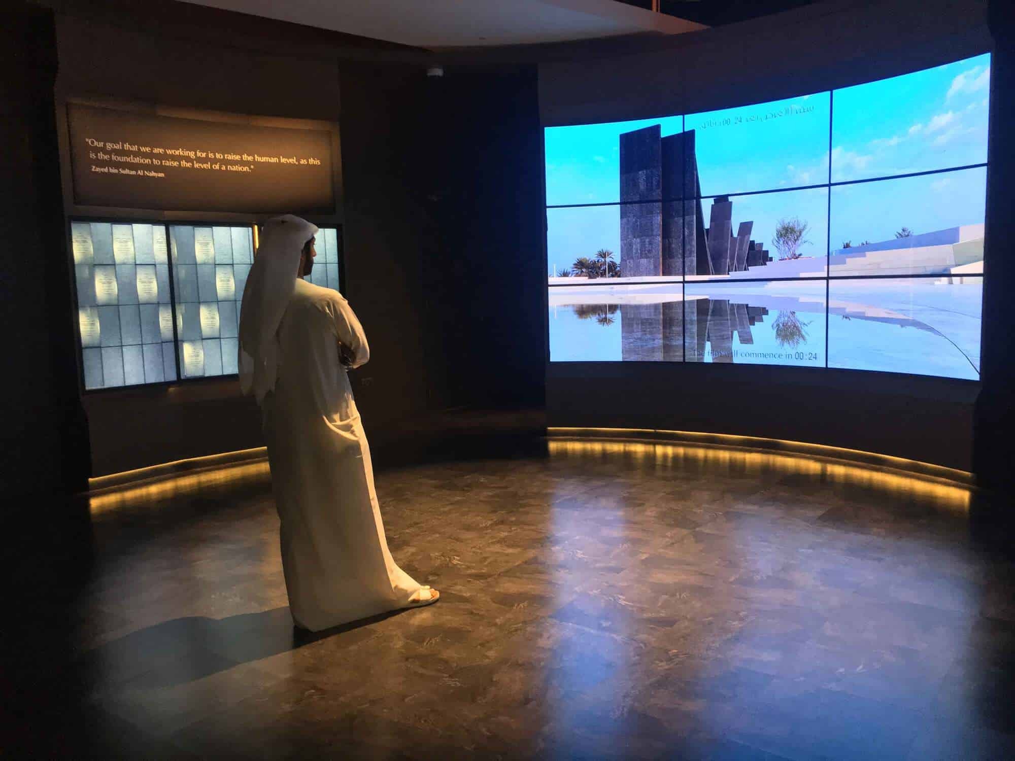 Man standing in front of LED screen