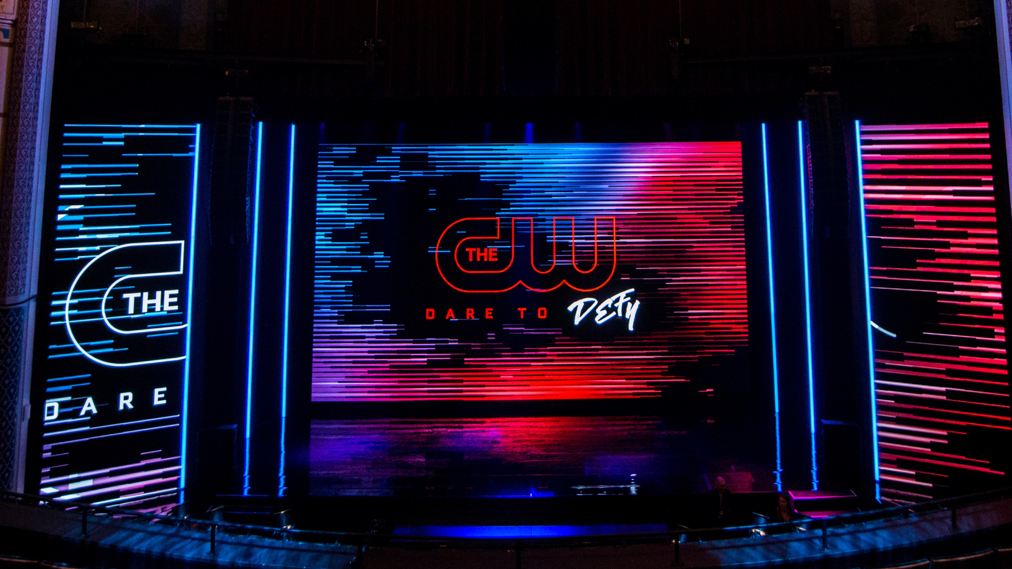 CW Upfront main stage with red and blue lighting