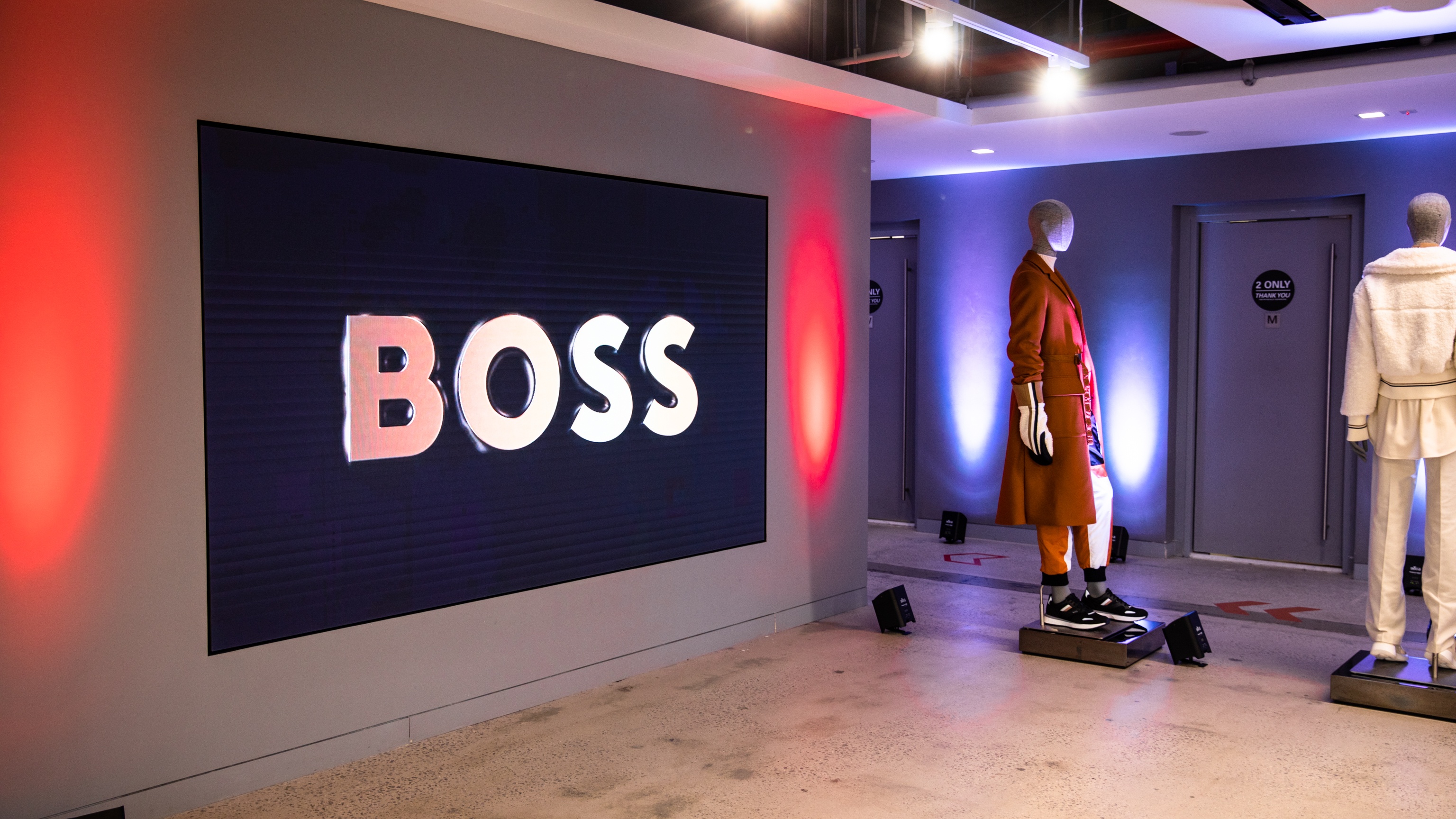 Wall with BOSS on it with red lighting