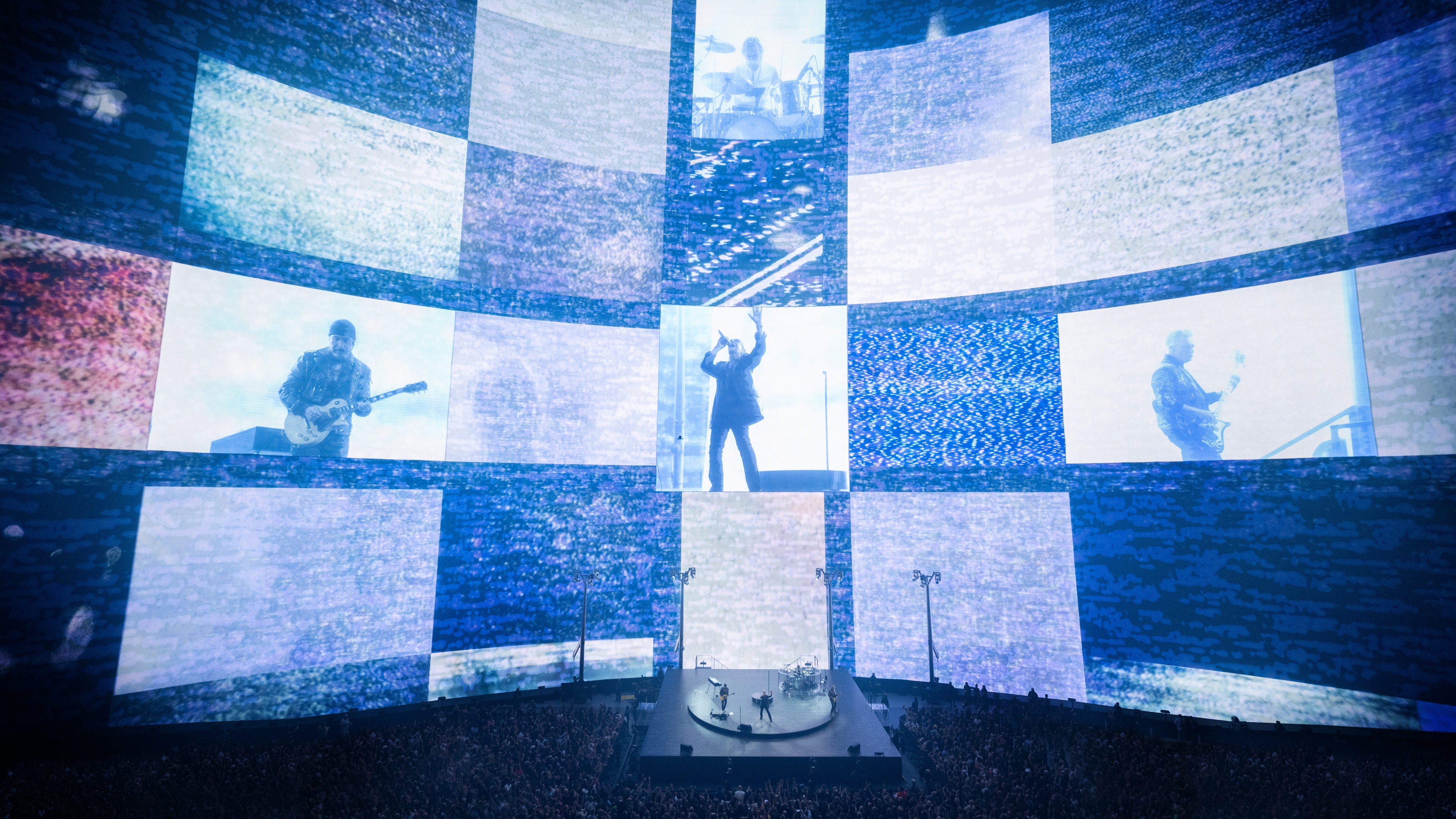 U2 in front of huge LED screen playing at the Sphere in Las Vegas