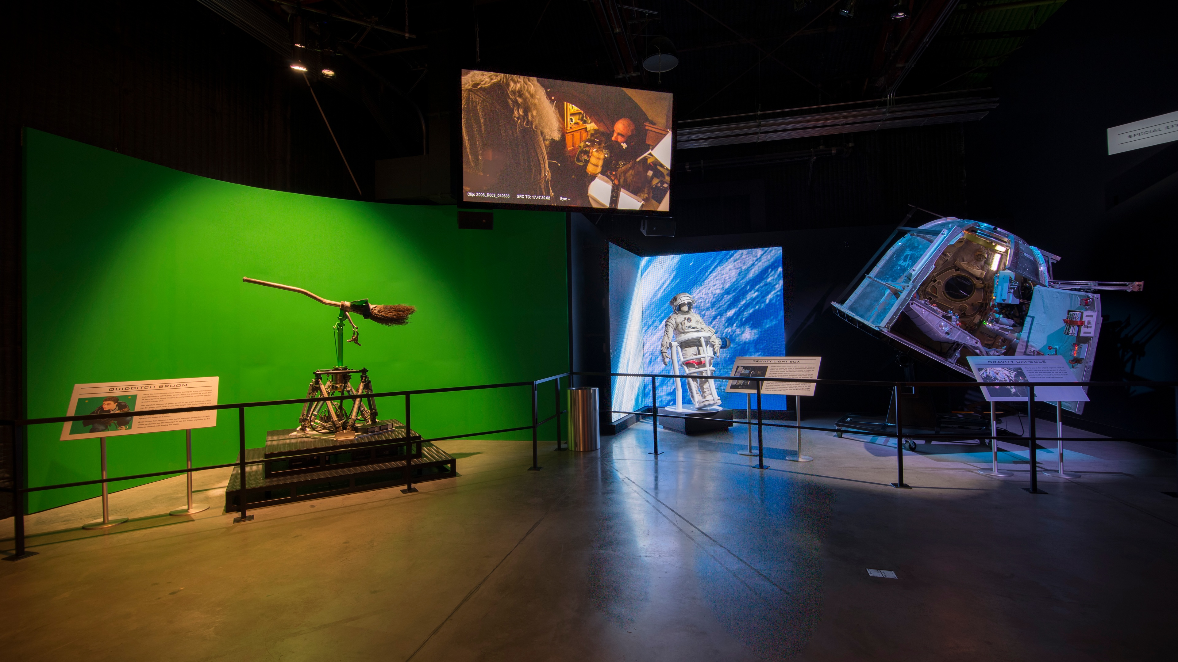 Indoor exhibit with Hollywood props and LED screens