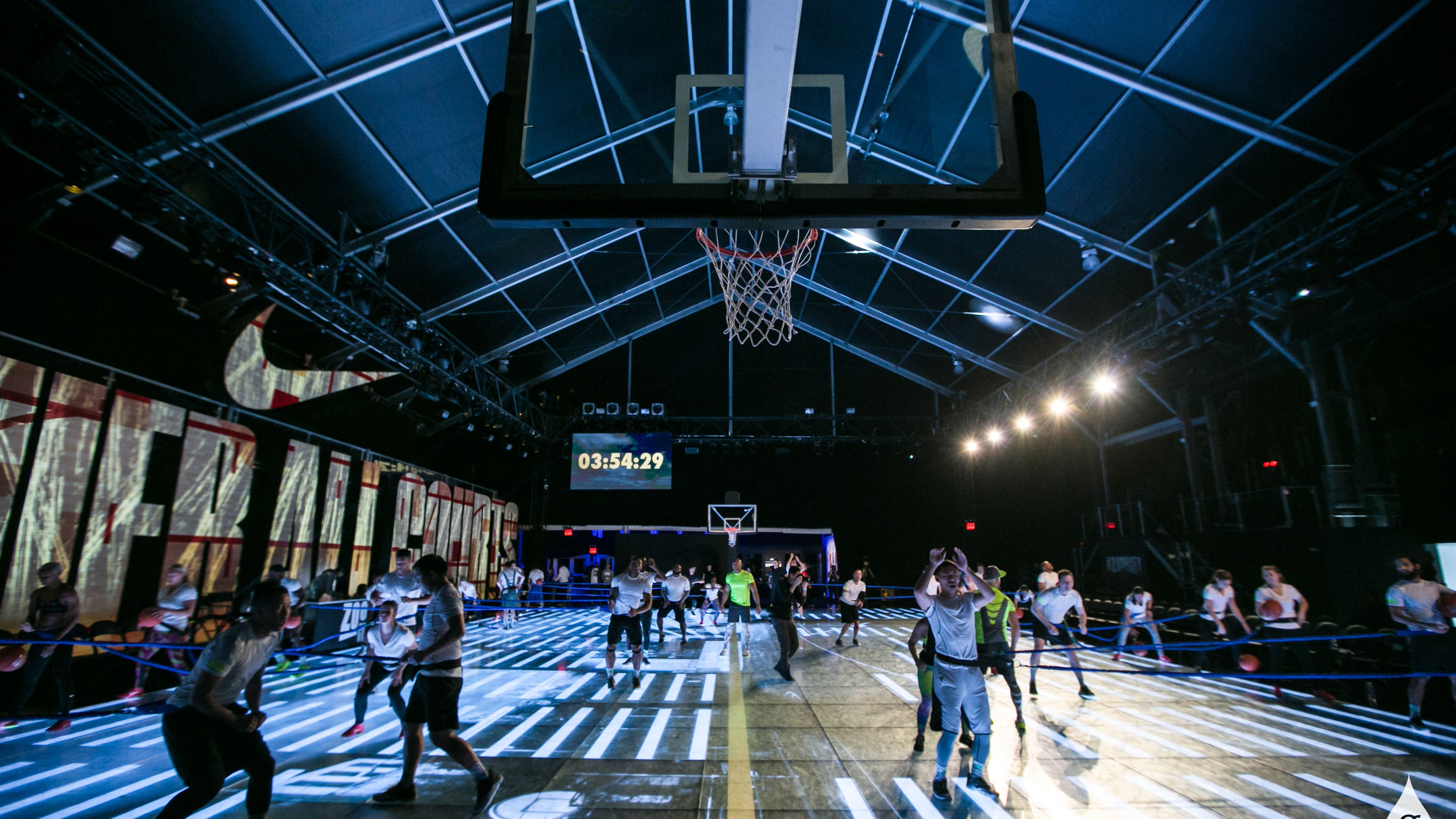 Basketball players on court during game