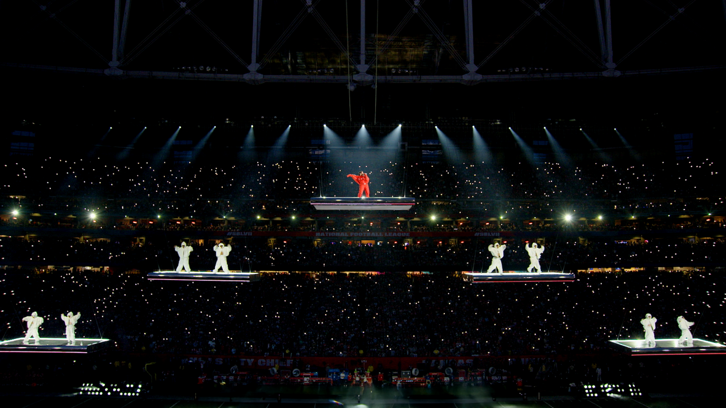 far out image of Rihanna and her performers each on individual floating stages