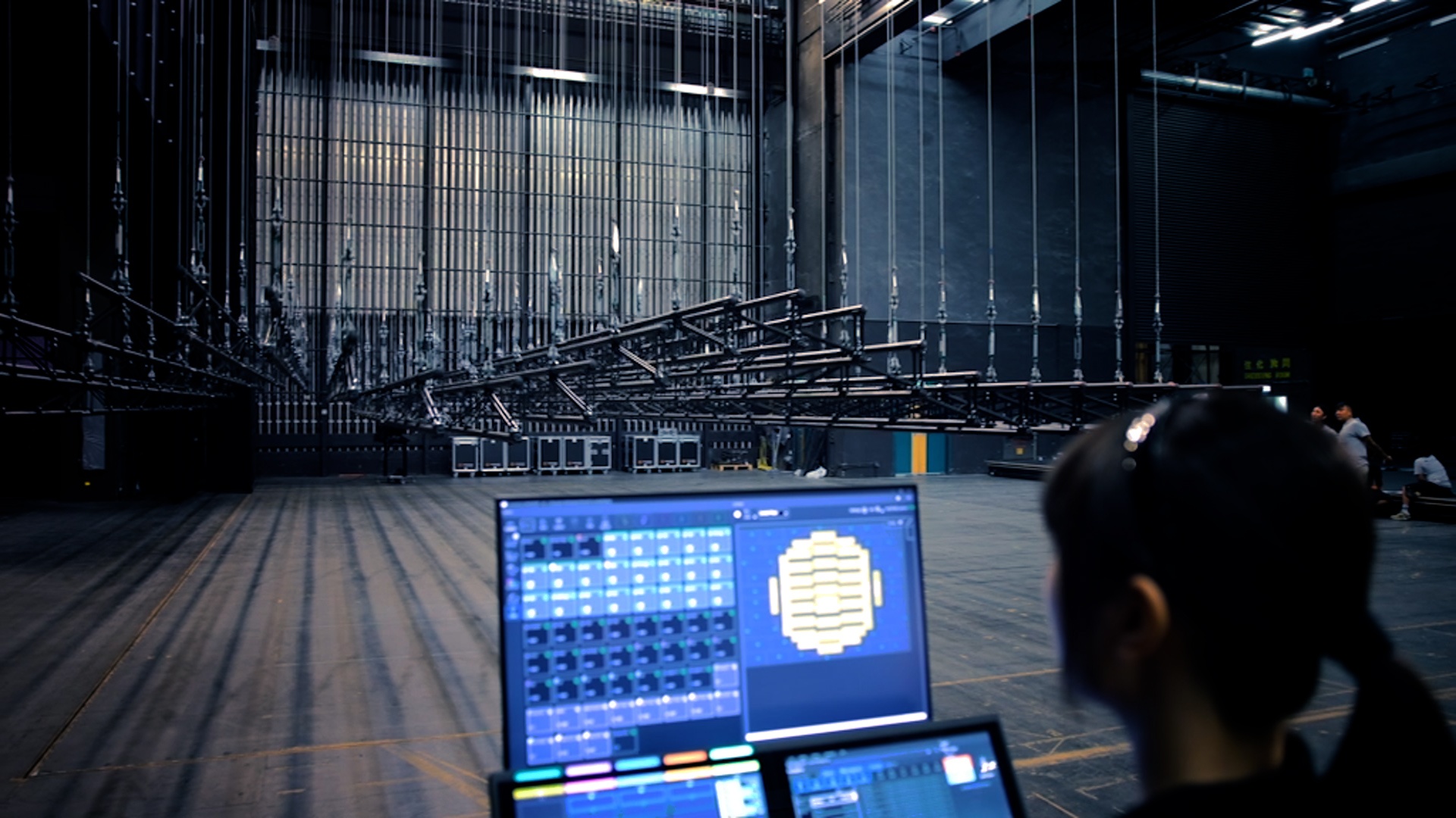 Female TAIT team member integrating Yuen Long Theatre automation system