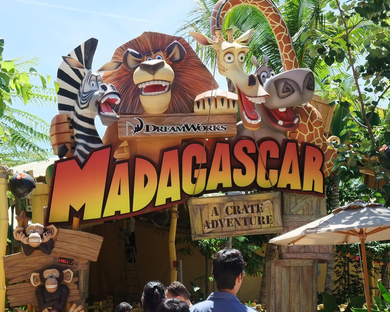 Guests walking into the Madagascar ride entrance