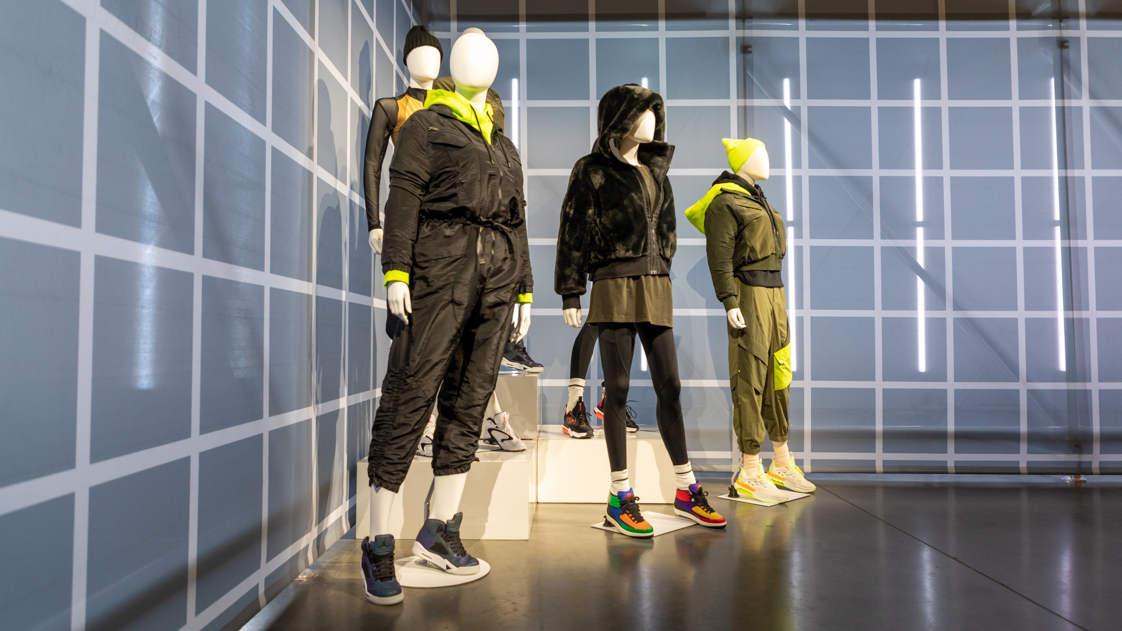 Mannequins in black and lime green Jordan women's apparel