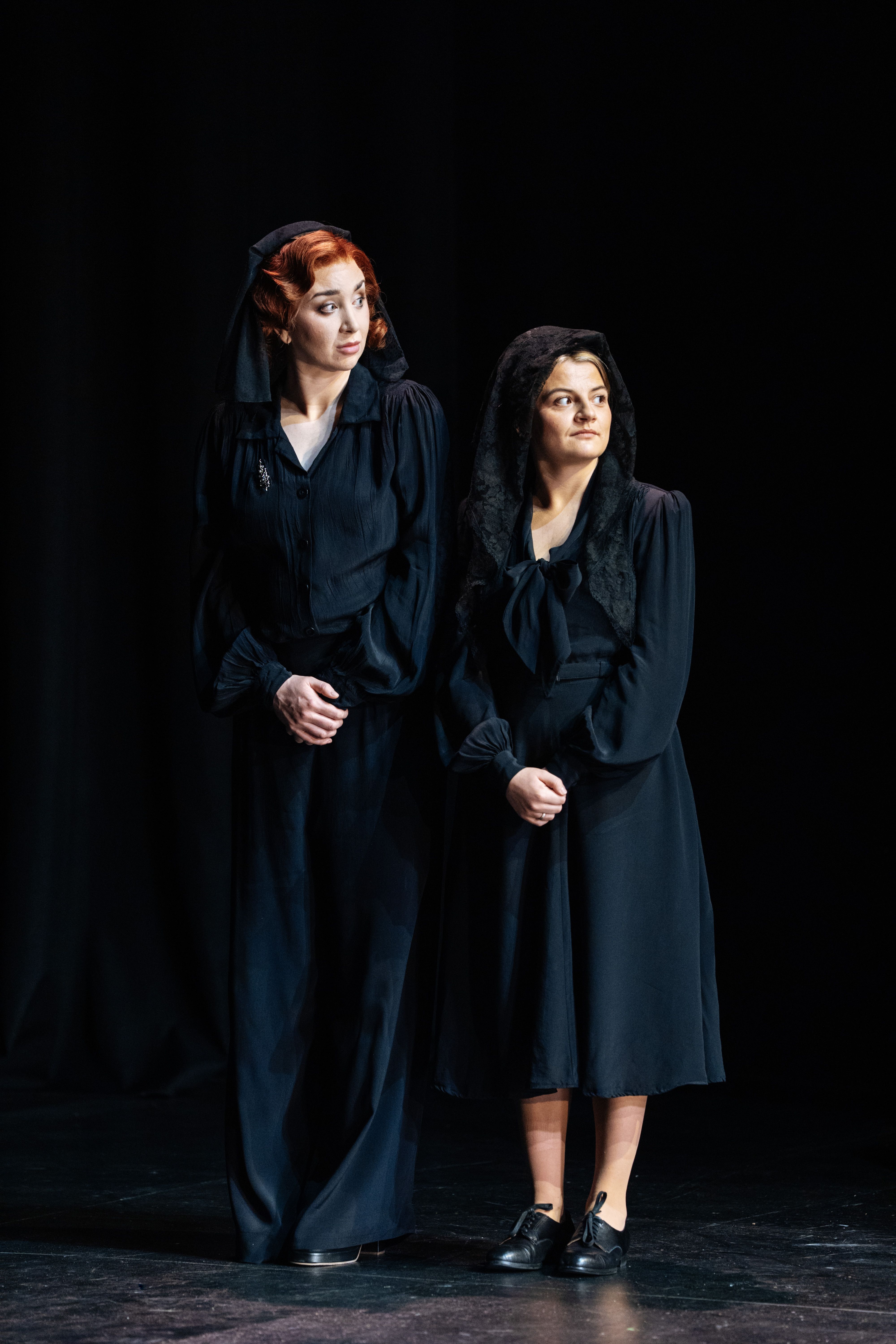 2 female performers on stage