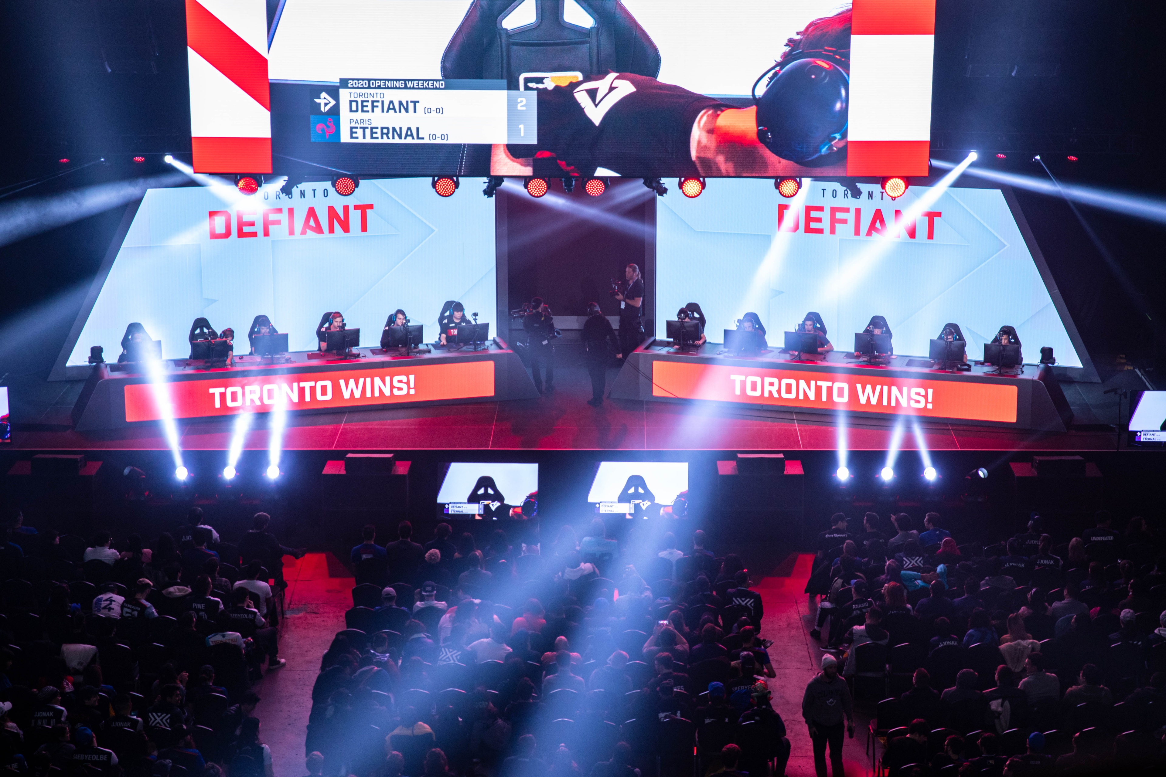 Toronto Defiant team on stage with computers competing