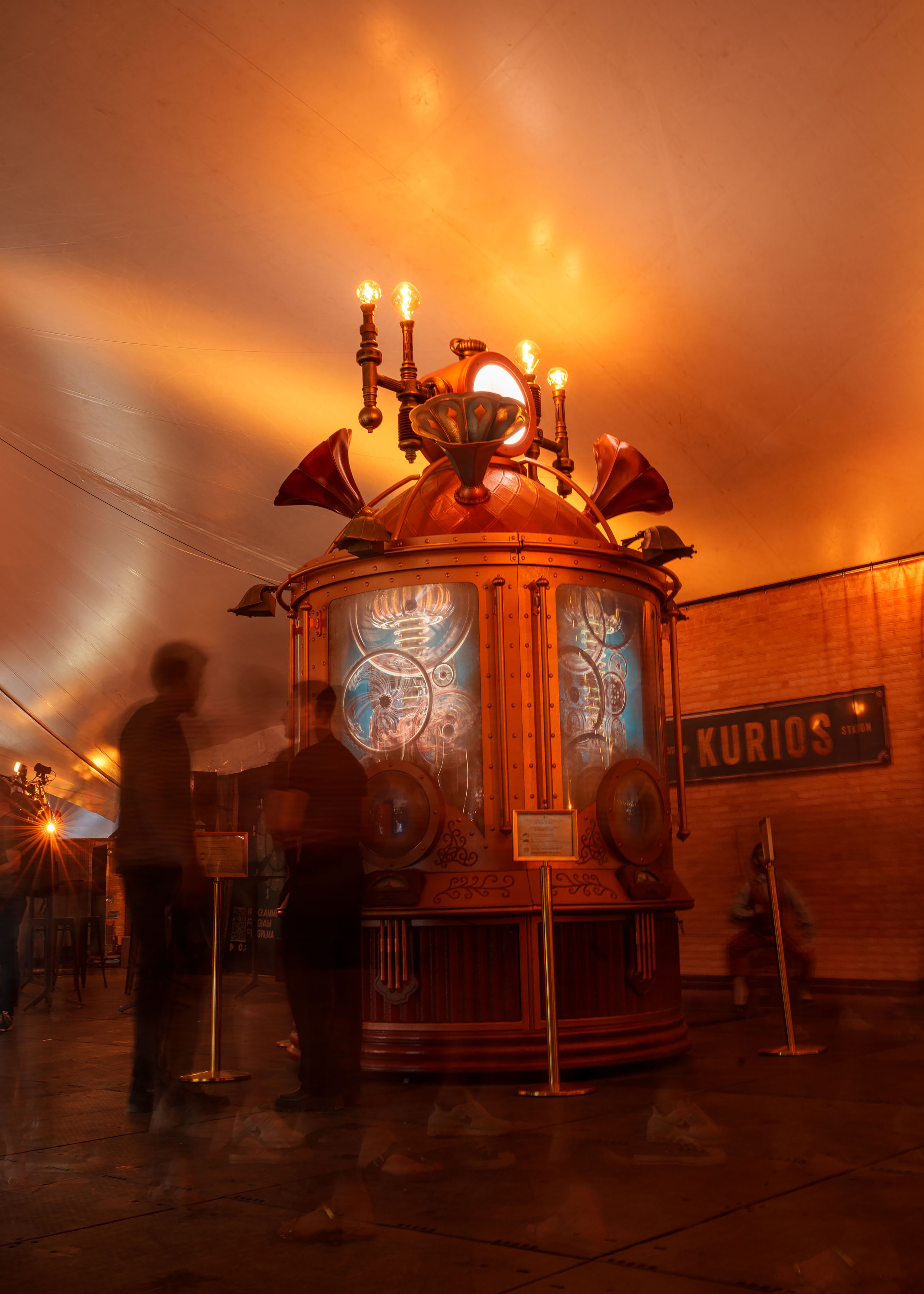 Lobby with steam punk looking light object in center