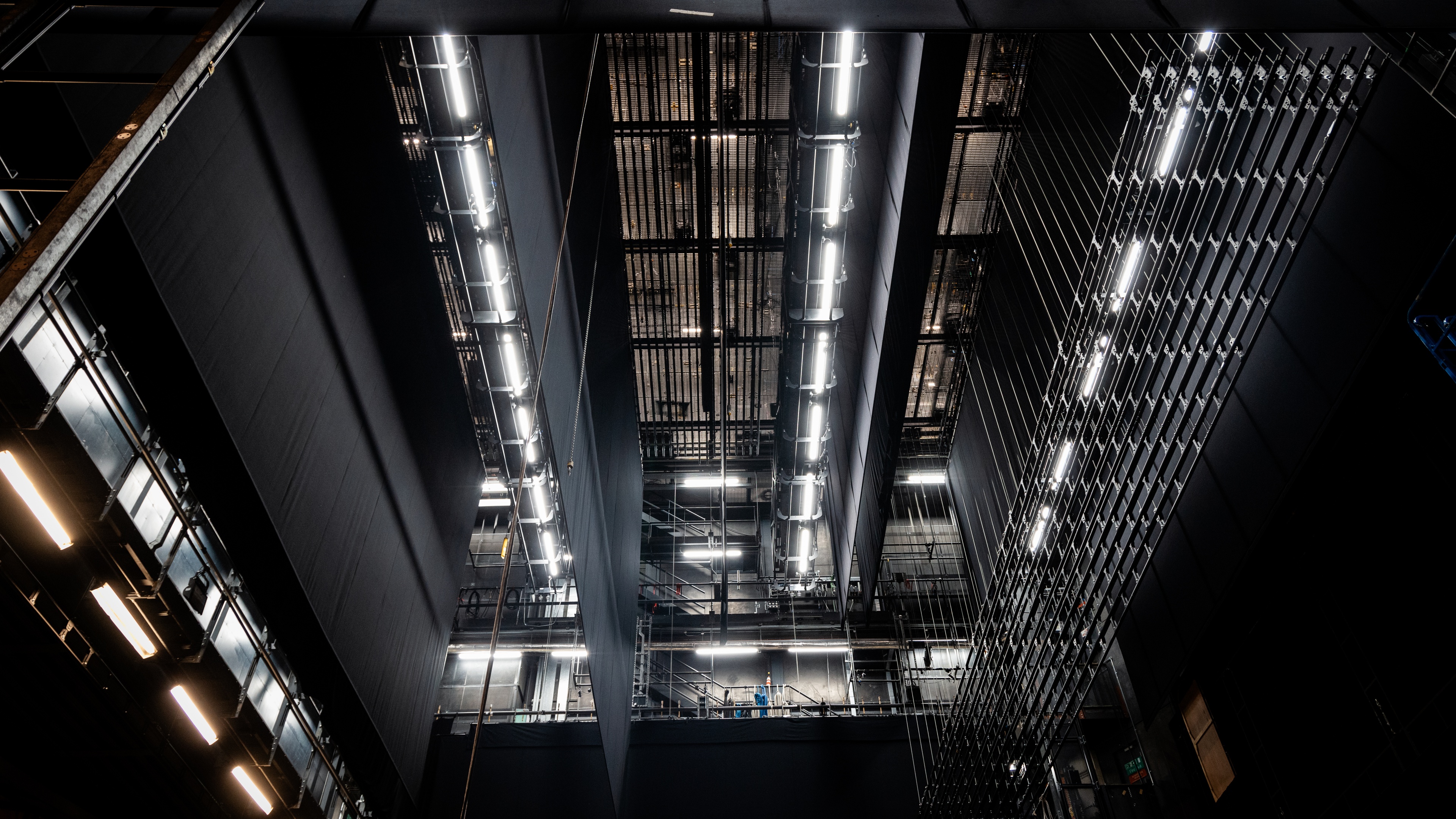 View of automated fly bars behind the stage at Glyndebourne Opera House