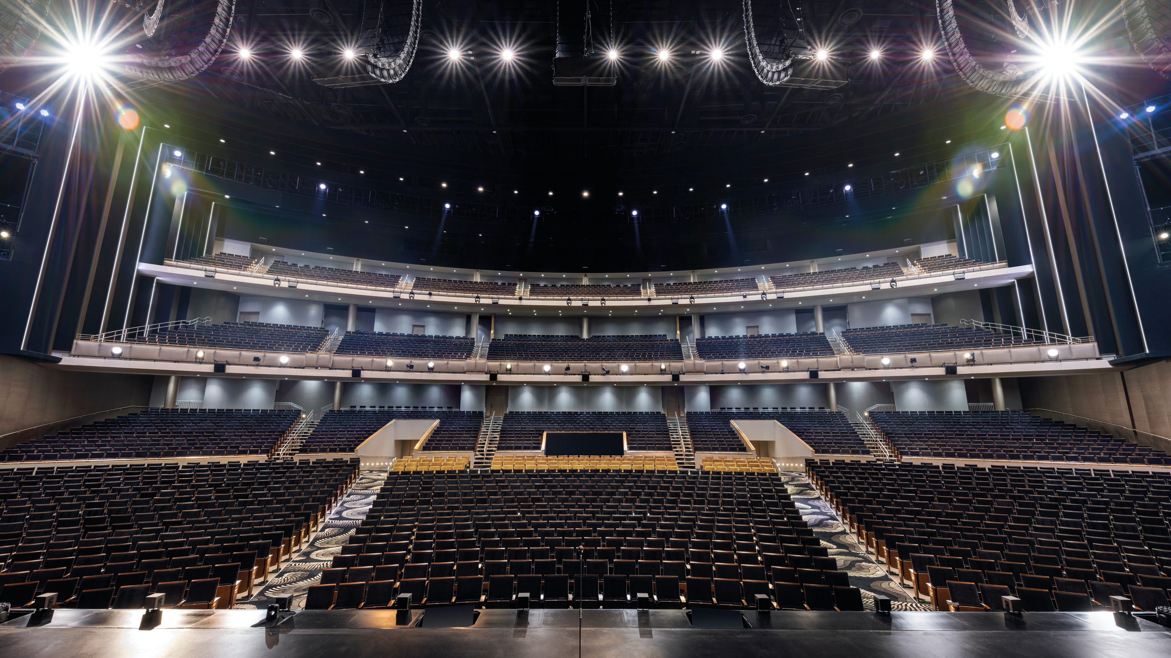 Photo taken from stage at Resorts World Las Vegas looking at the seats with spotlights
