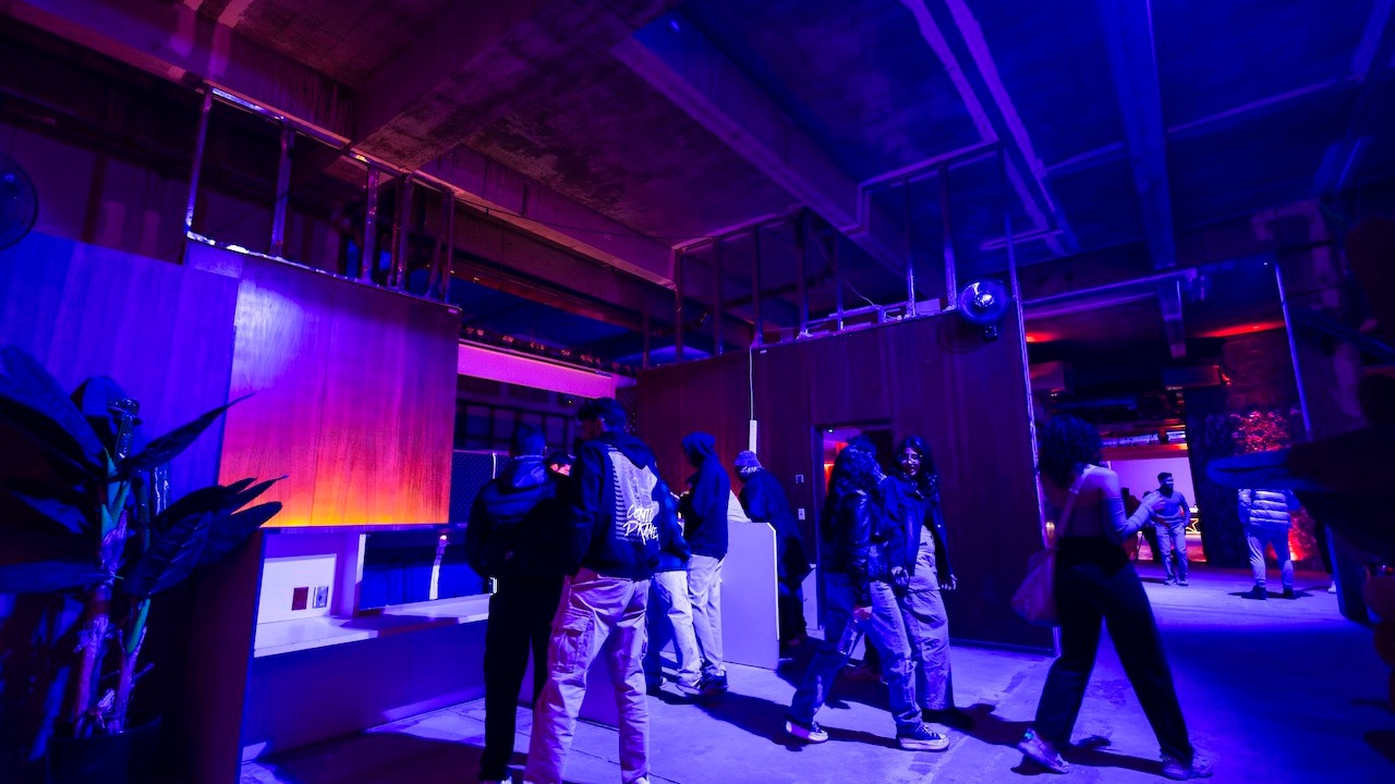 People standing at a reception area in industrial building
