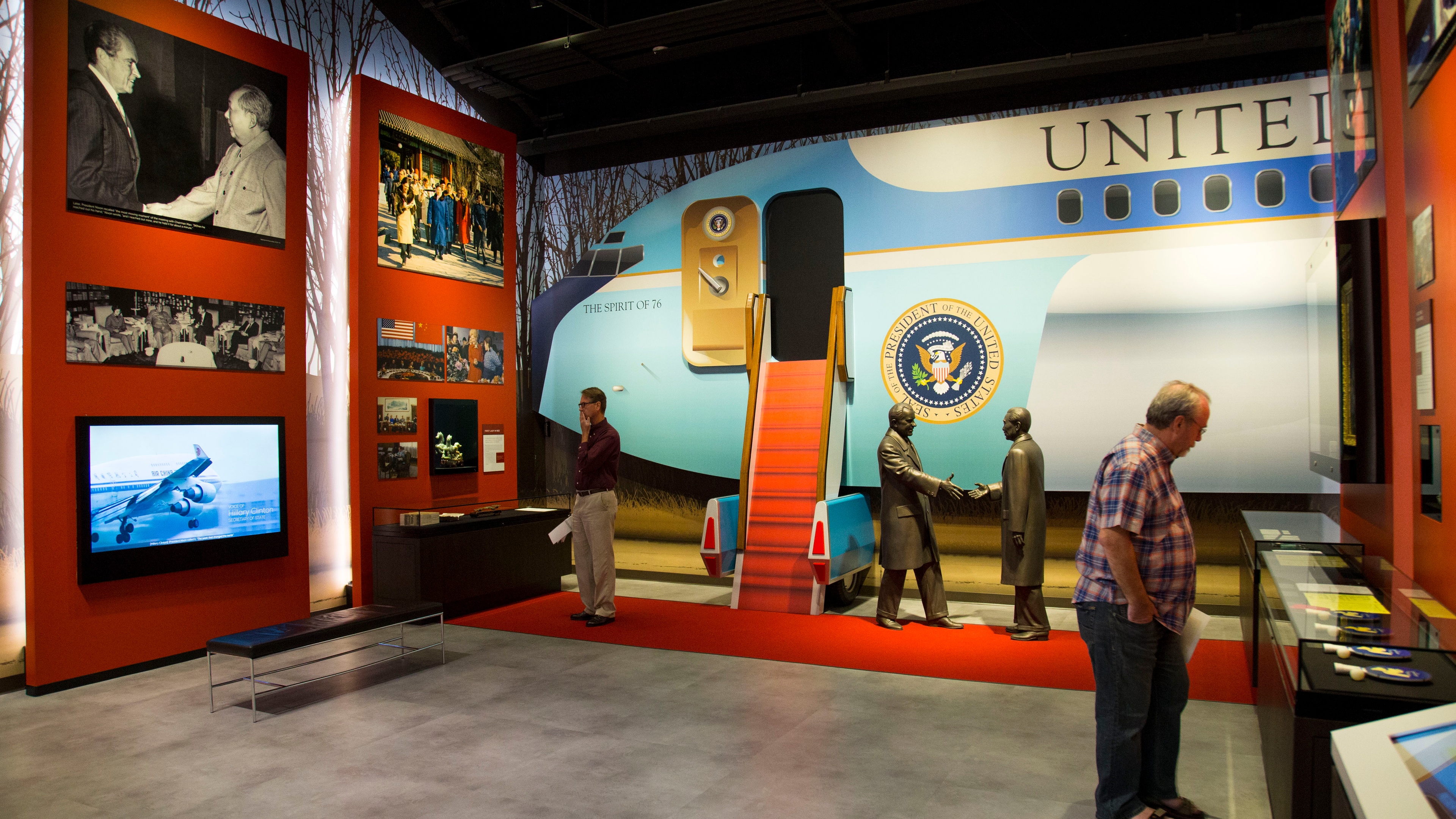 Exhibit of mock Air Force 1 plane with screens