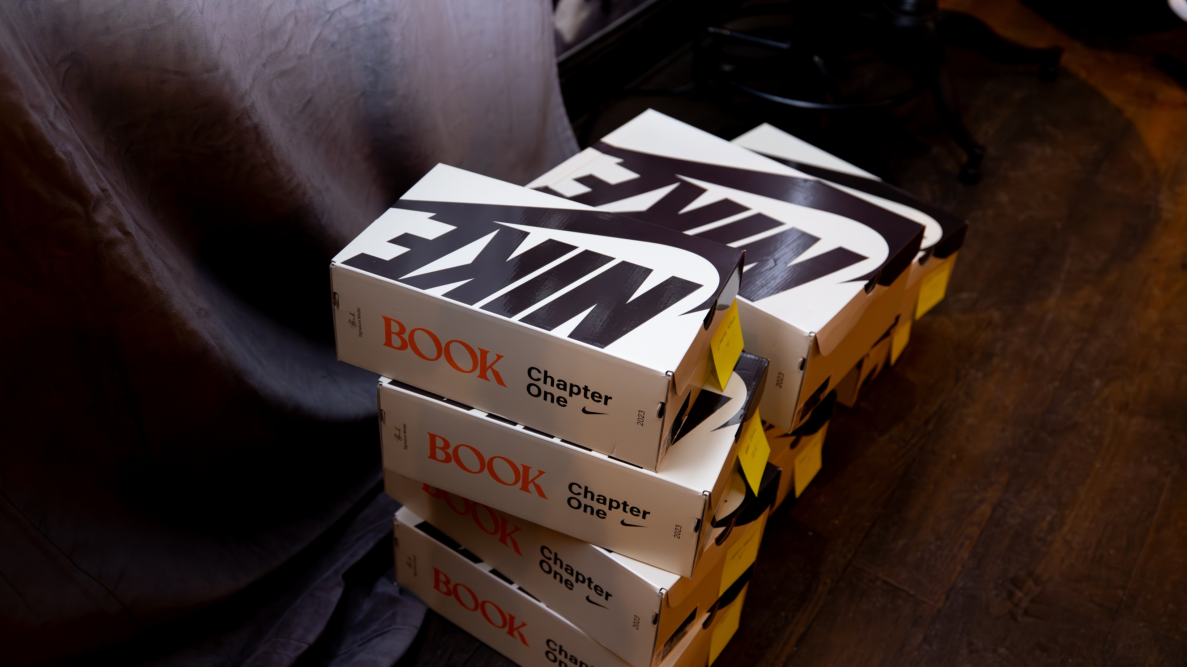 White Nike shoe boxes stacked up