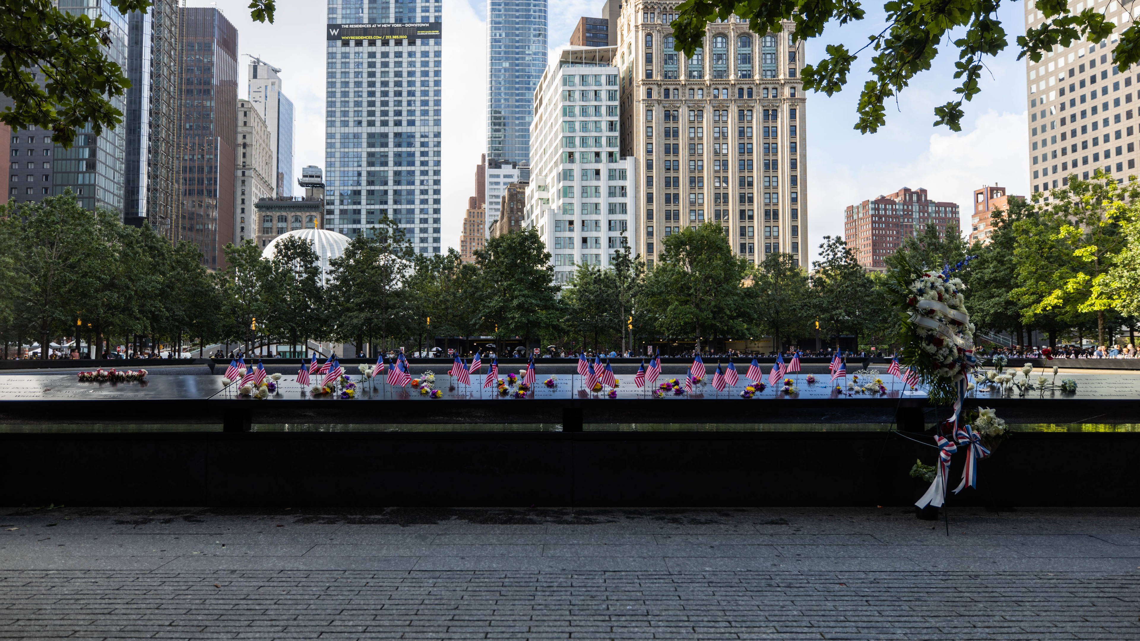 American flags and flowers laid at Ground zero memorial