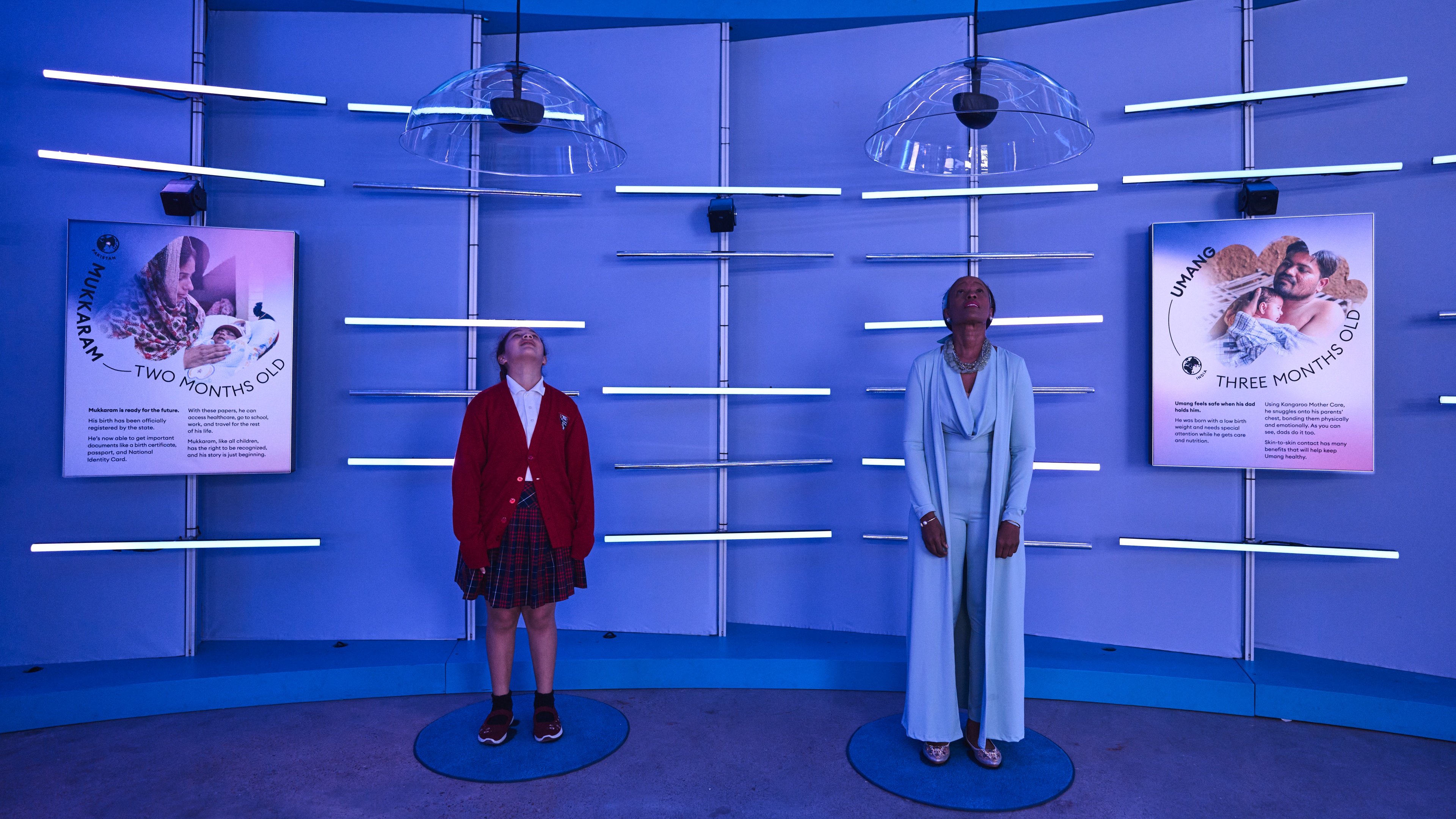 People interacting with display