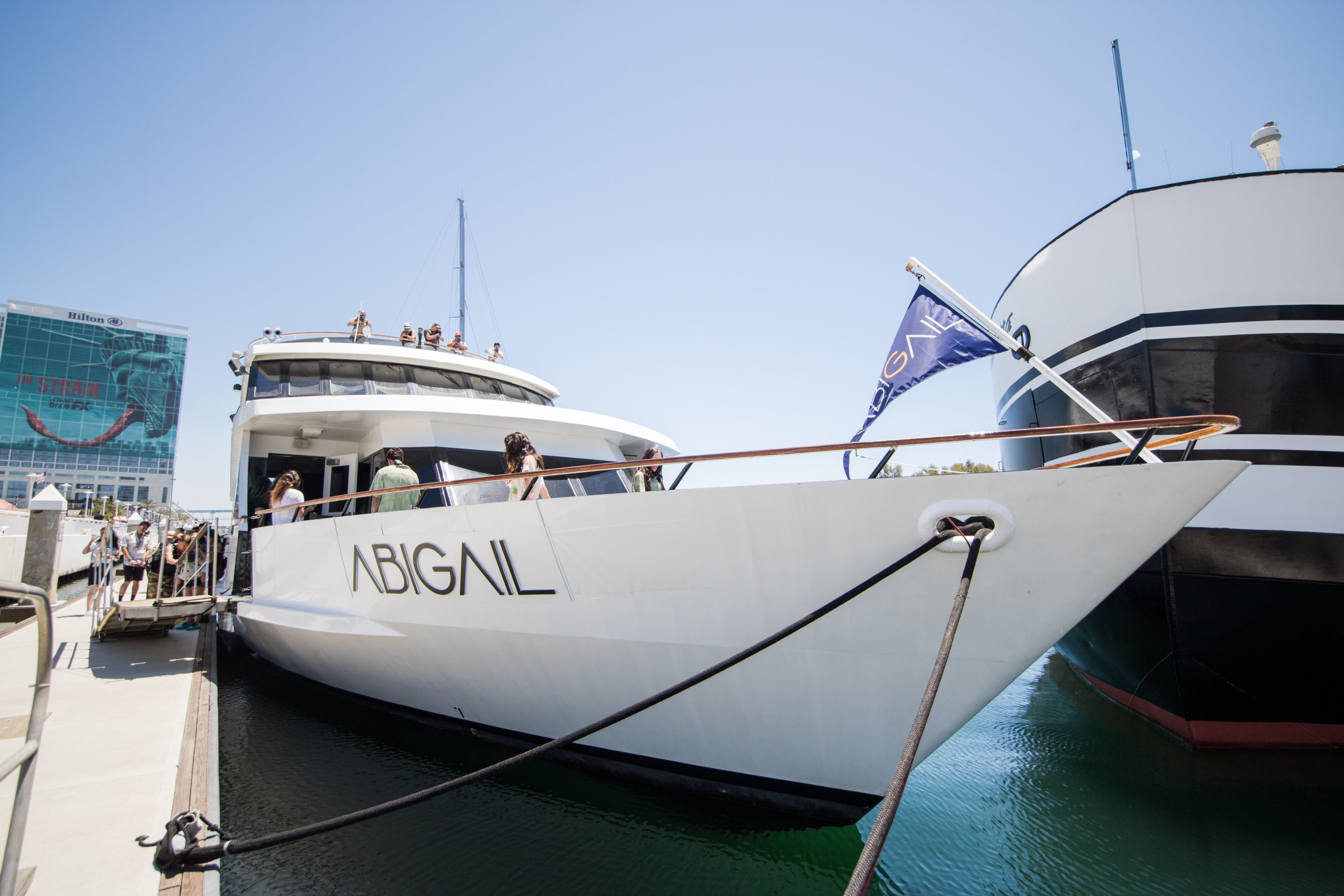 White yacht named Abigail docked