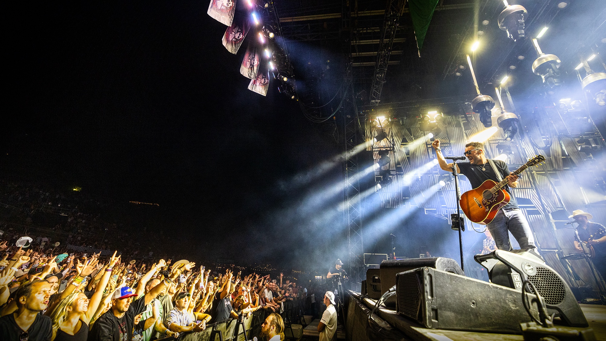Country artist Eric Chruch engaing with crowd