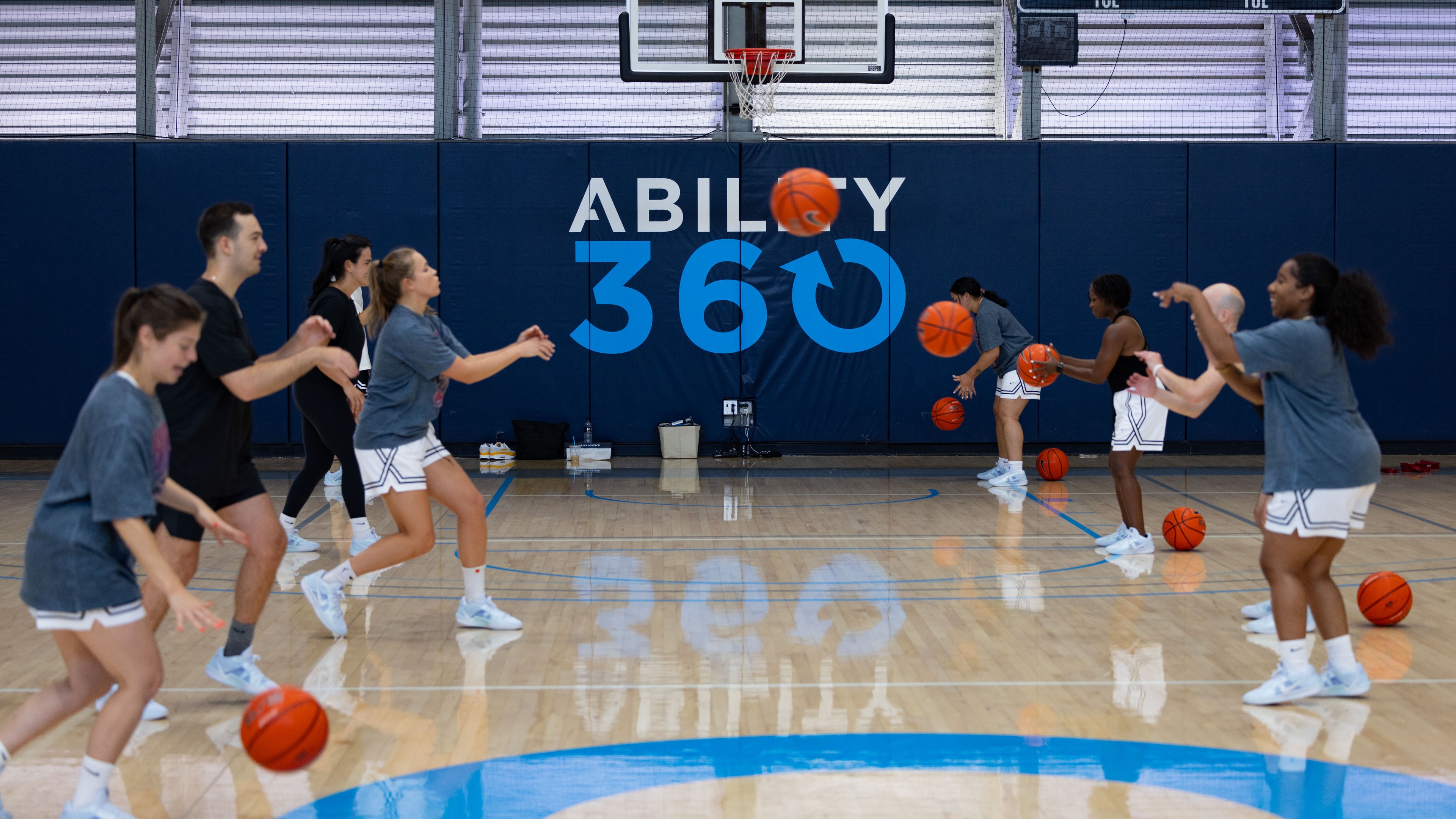 Basketball players passing basketballs