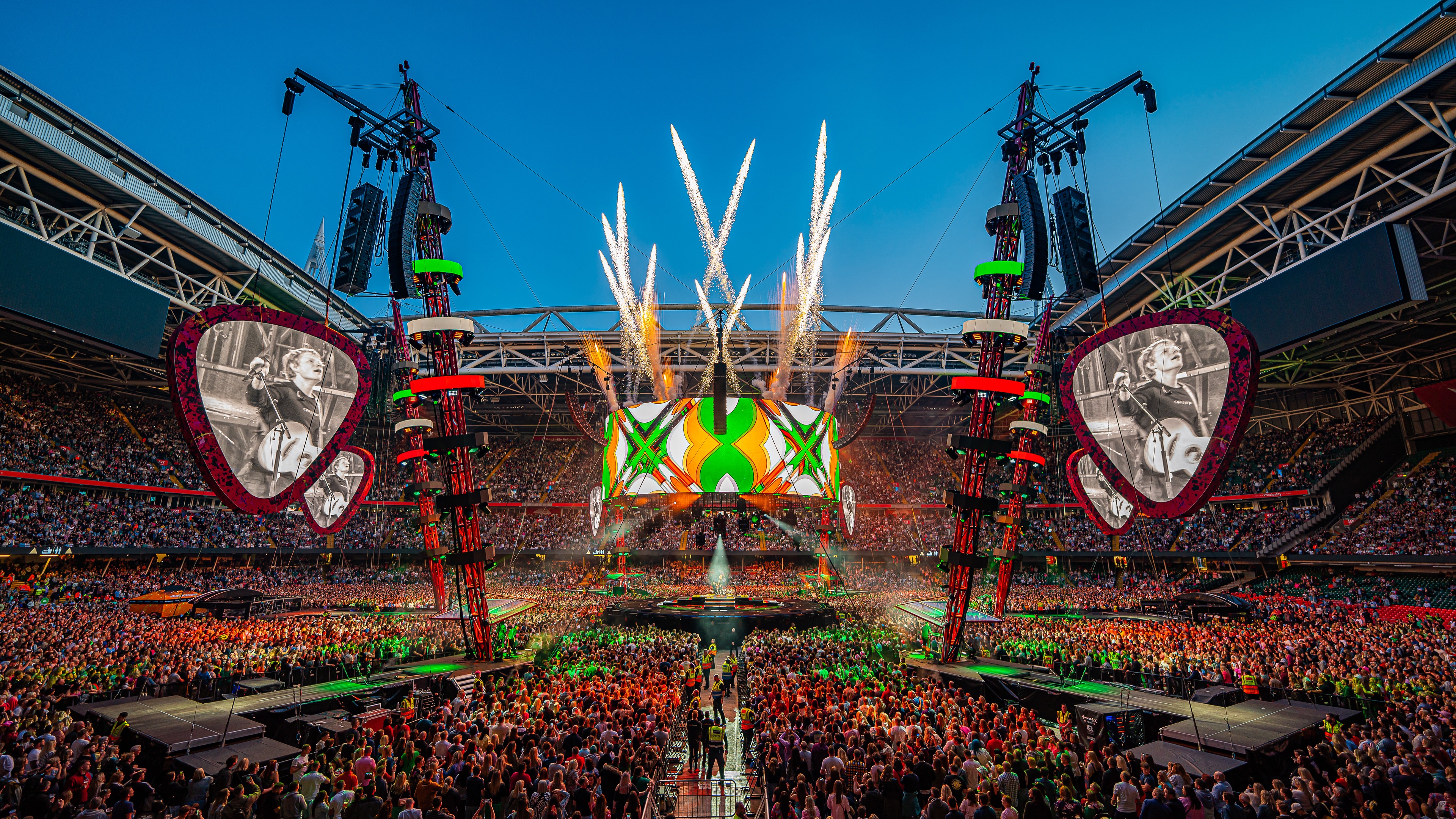 Ed Sheeran Mathematics stage with pyrotechnics coming out of top with large stadium crowd