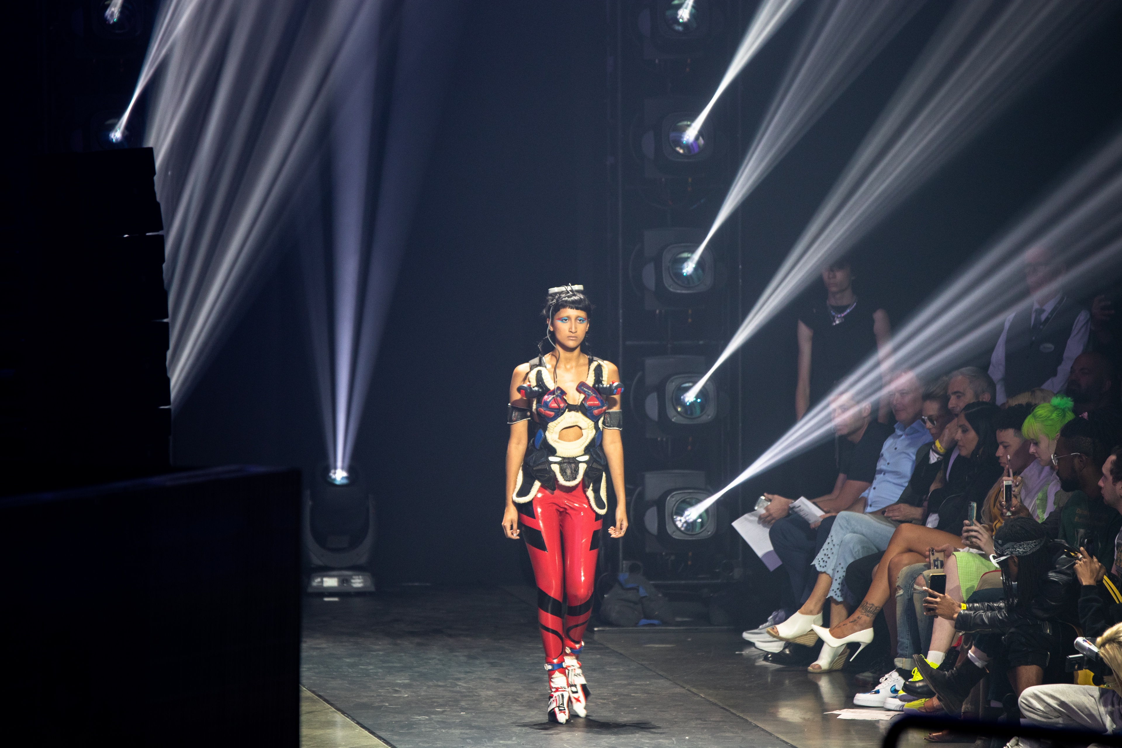 Model walking on runway