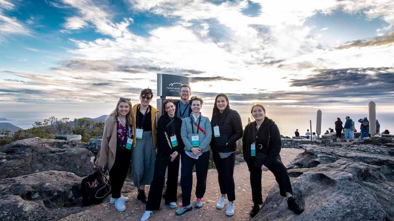 TAIT team members posing for a photo outdoors