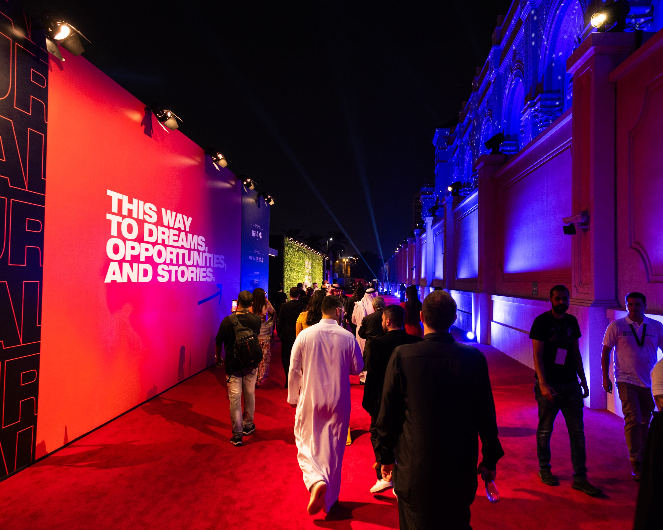 People walking a red carpet