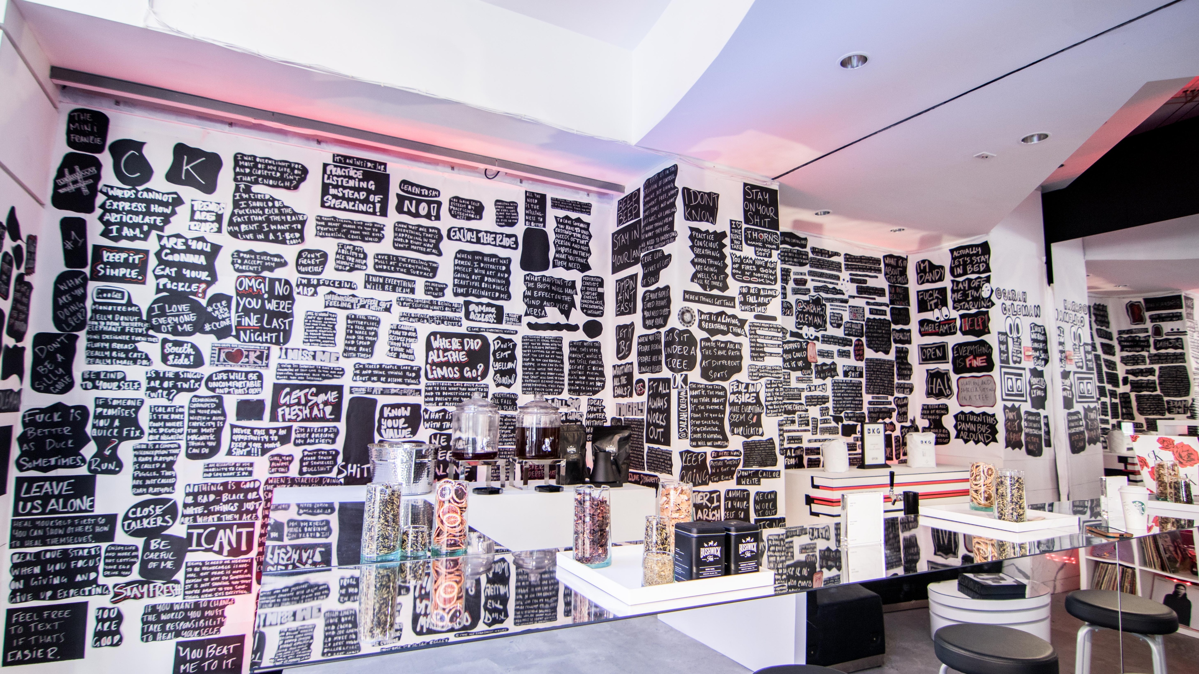 Wall of messages on it in white letters and black background