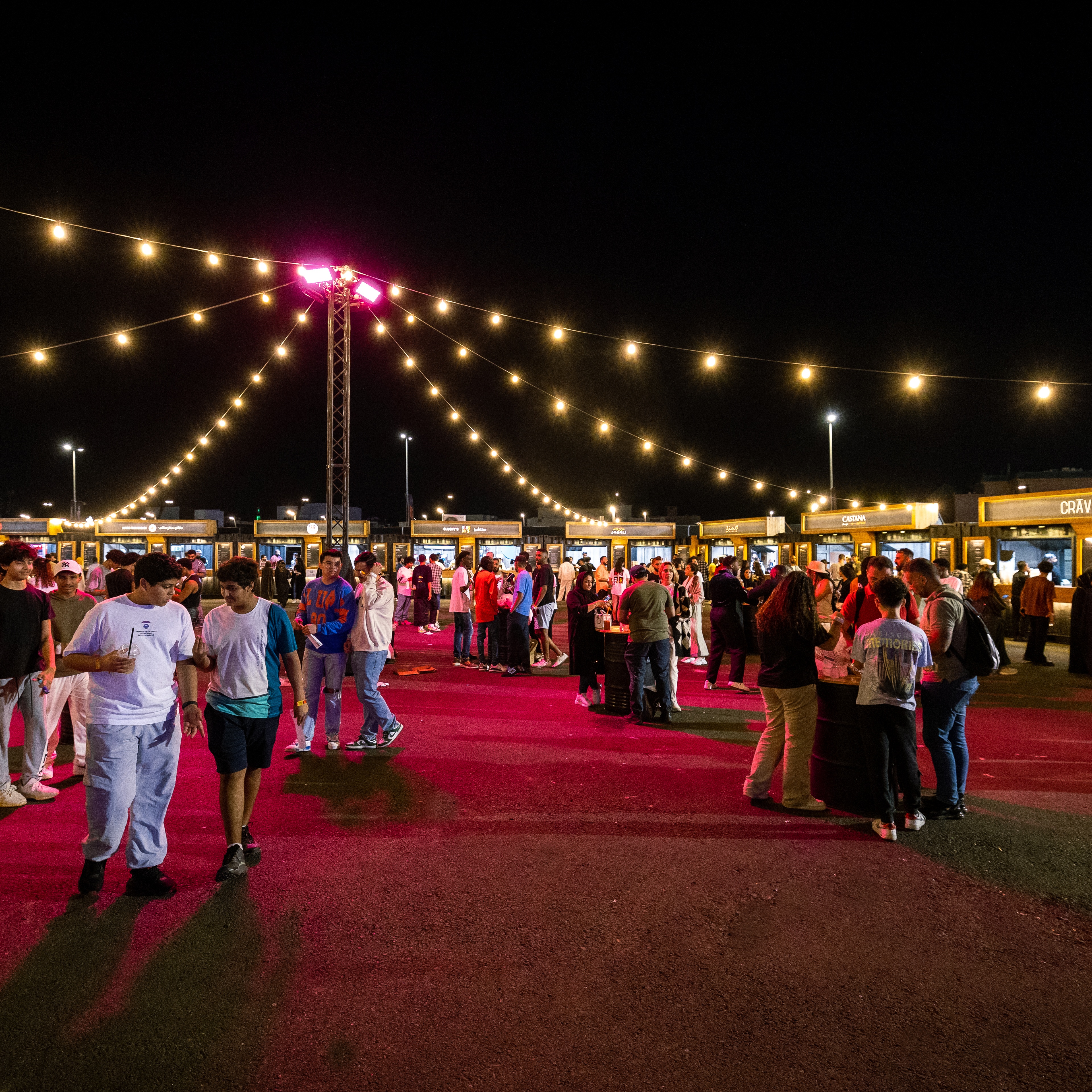 Formula 1 Saudi Arabian Grand Prix 2023 Concerts  crowd eating and drinking in food and beverage area