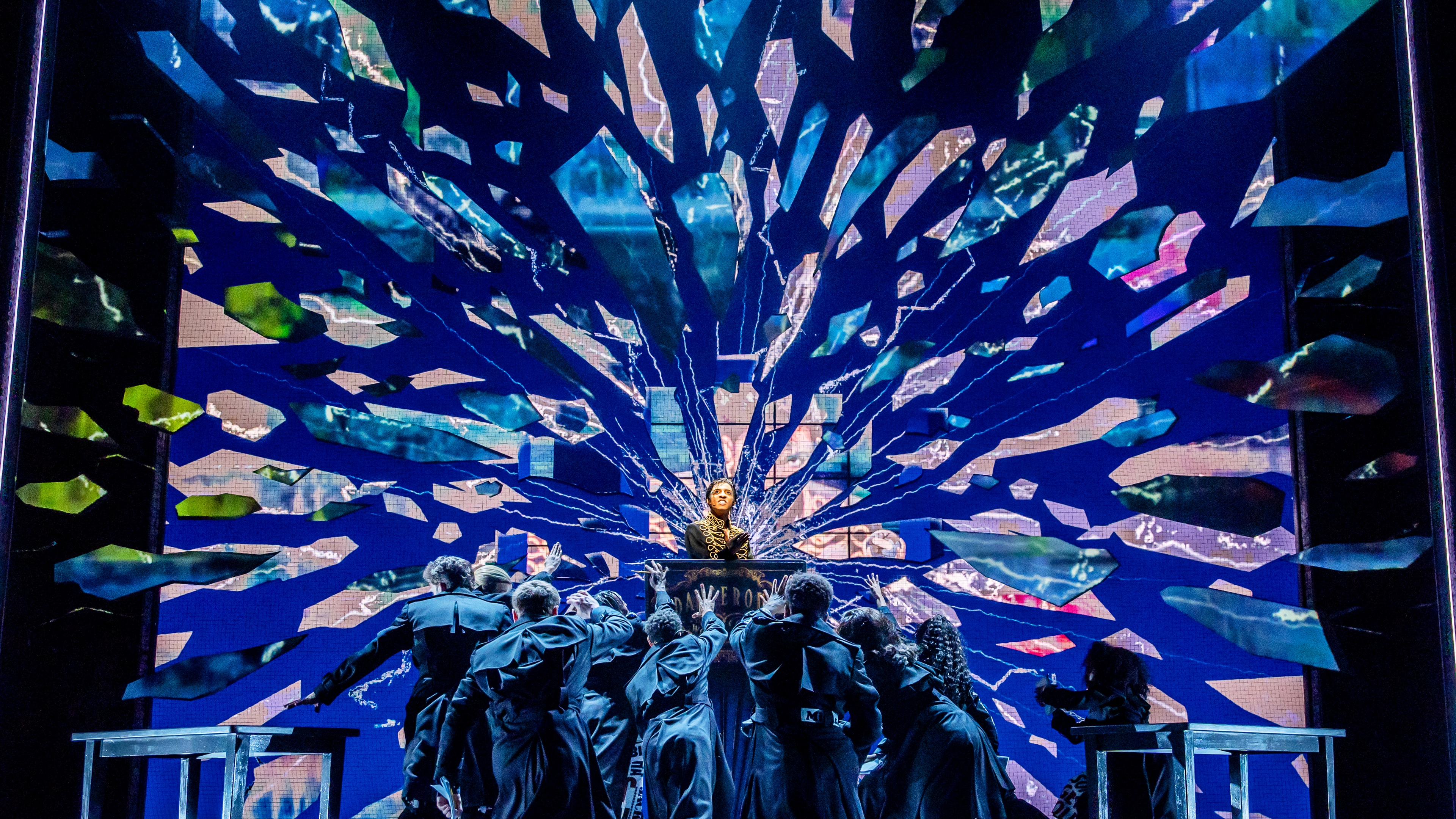 MJ the Musical performers dancing on stage with blue lighting