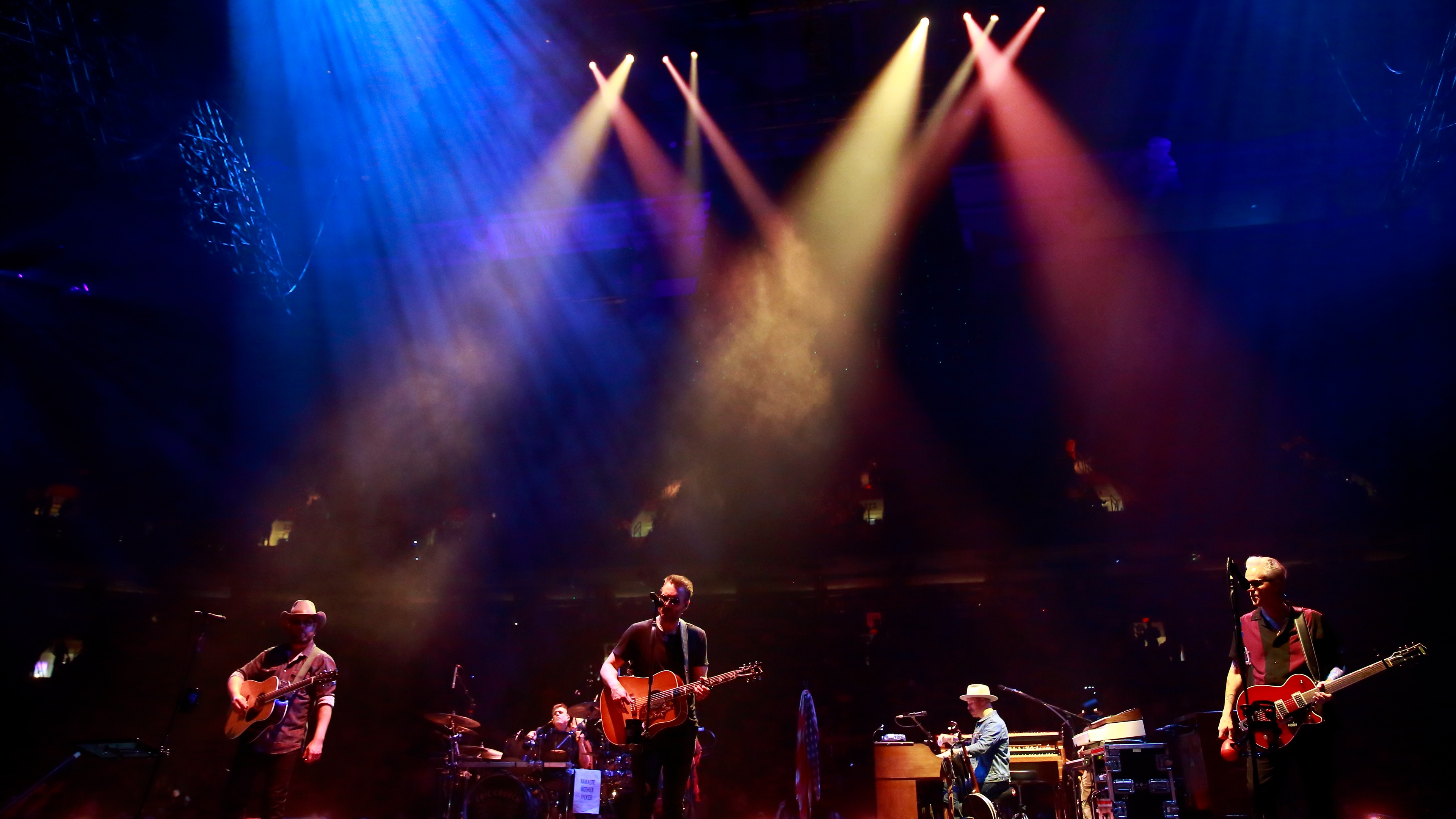 medium shot of Eric Church and band performing on stage during the Gather Again Tour