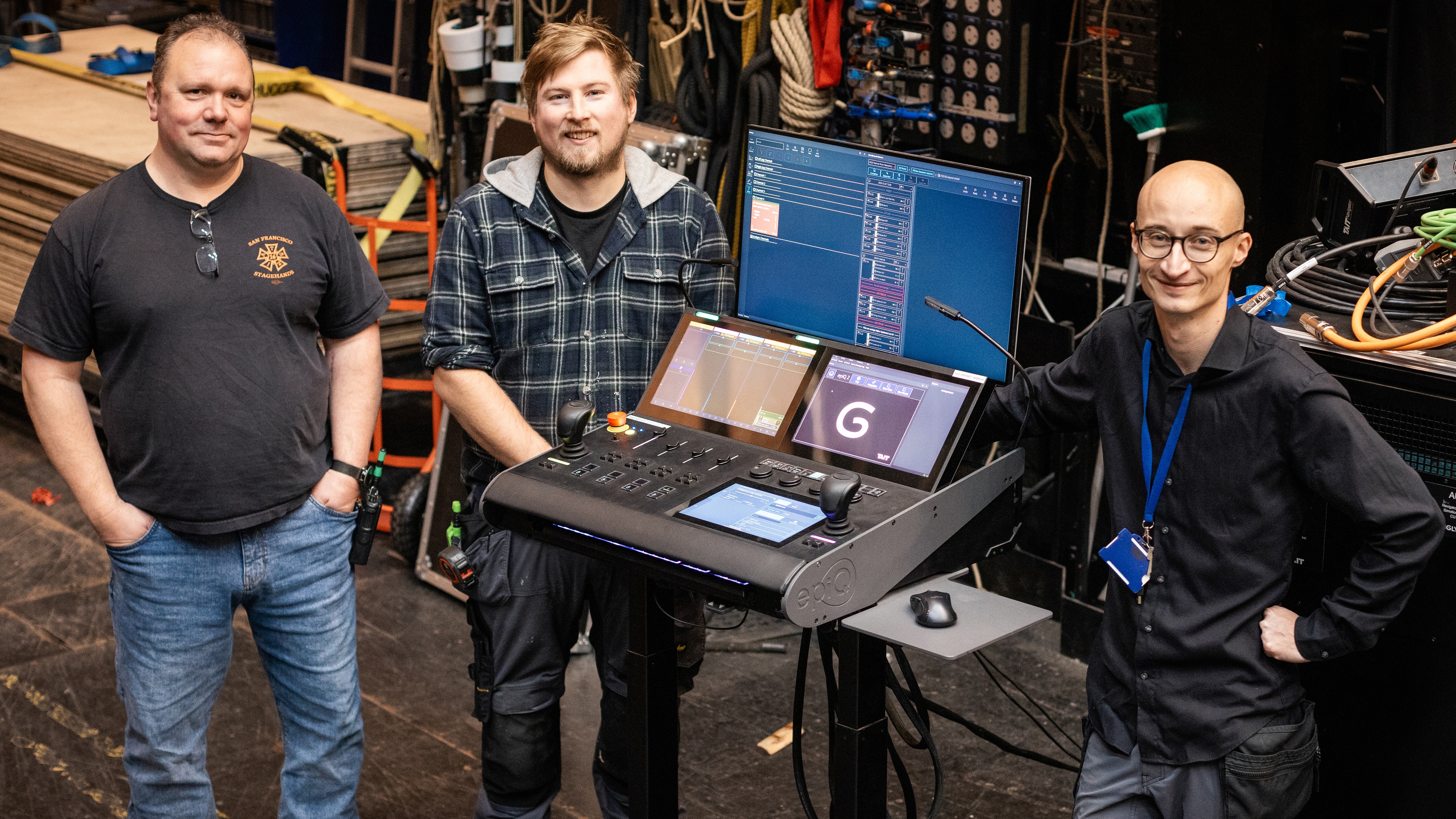 Glyndebourne Opera House automation supervisors stood next to epiQ console on stage