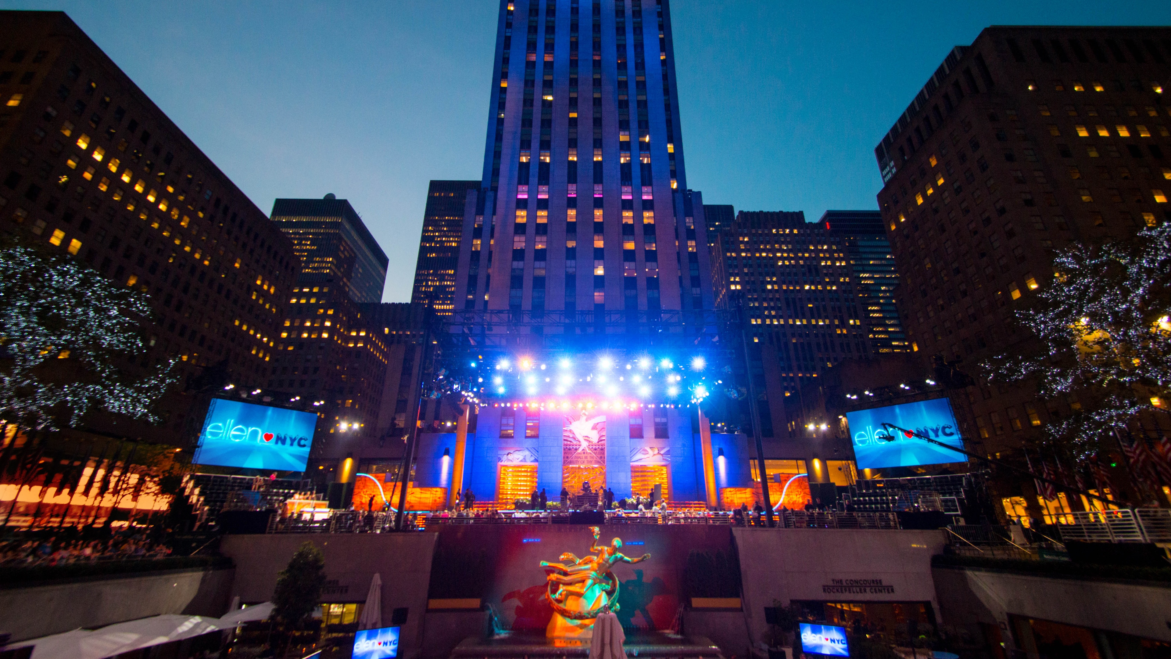 Rockefeller Center NYC lit up with a stage and lights